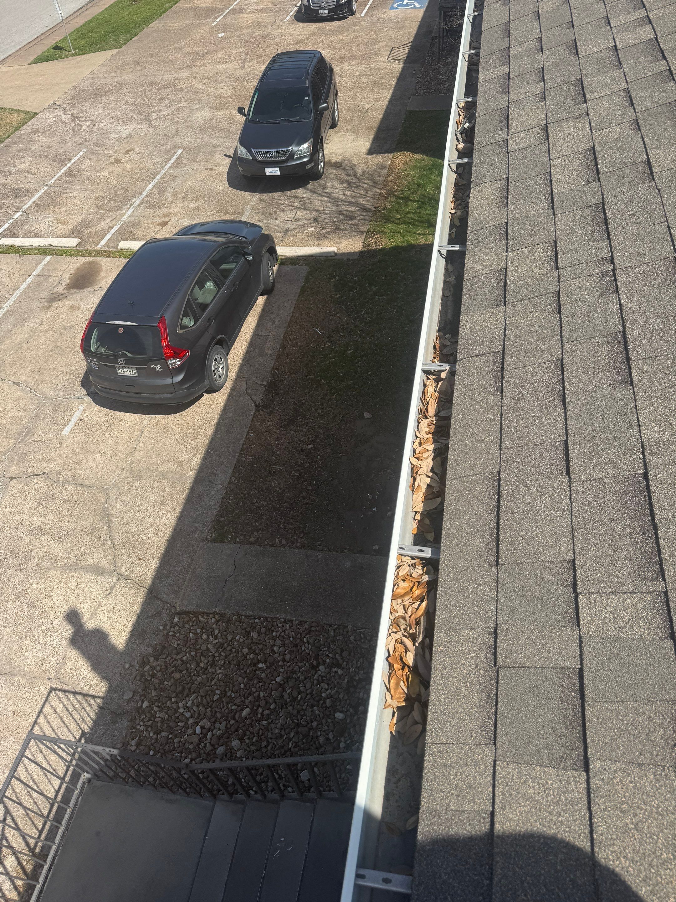 HOA gutter cleaning before photo.