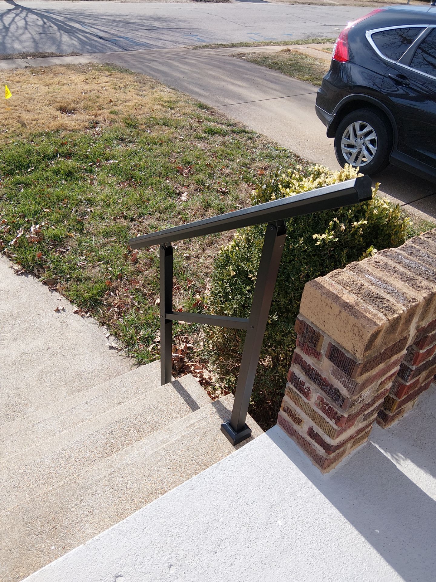 4-Step Aluminum Railing Installation – Concrete Entry Safety Upgrade – Brentwood, MO by Legendary Services Company LLC.