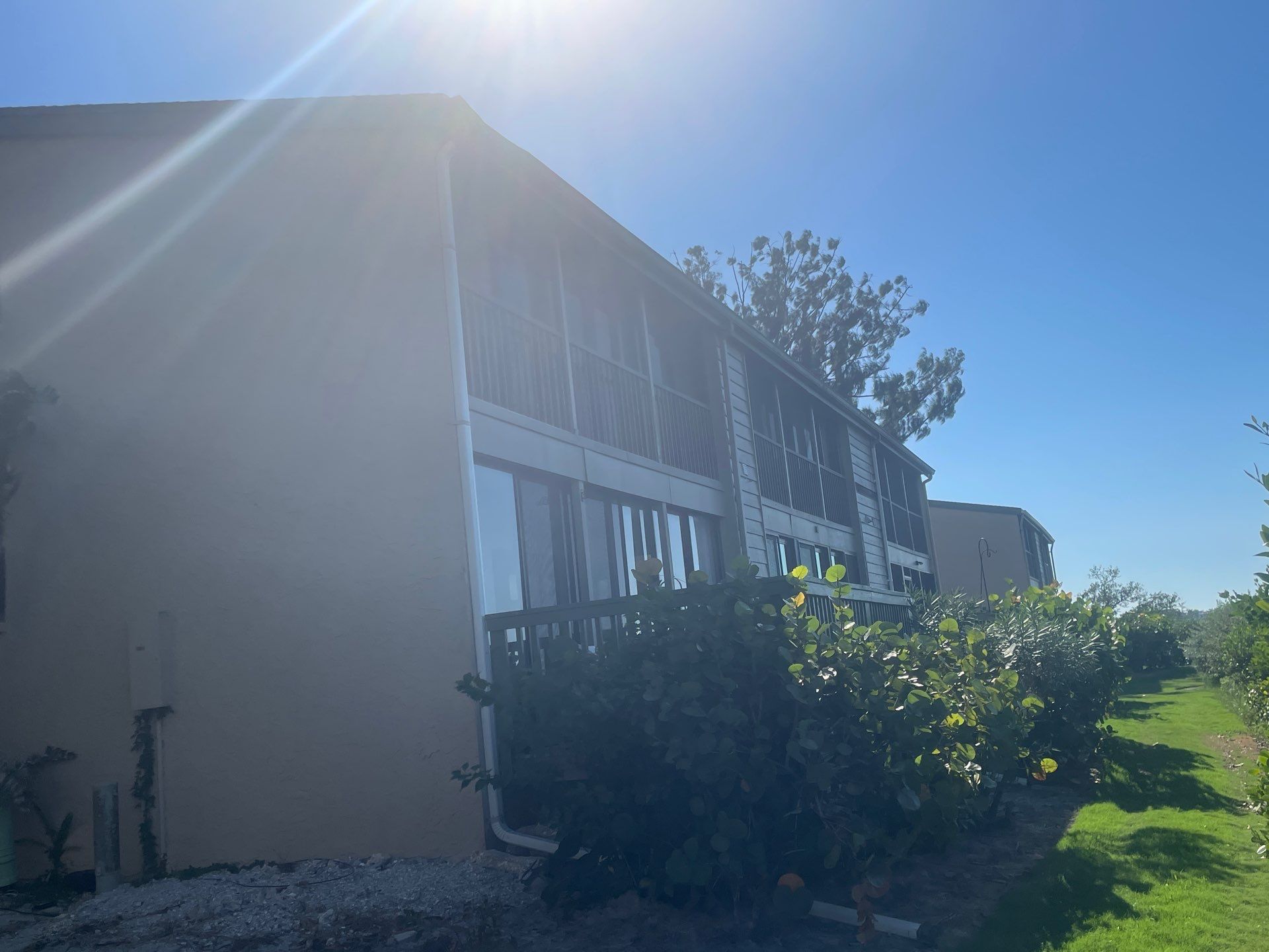 White Gutters Repair and Installation in Sarasota FL by Gutter Professors