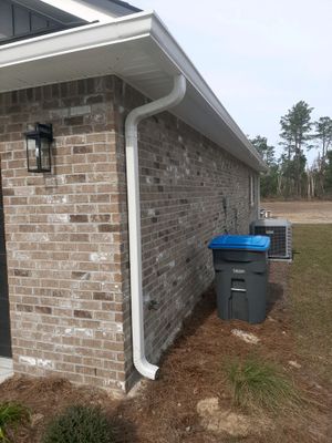 Seamless Gutter Installation Using White K-Style Gutters