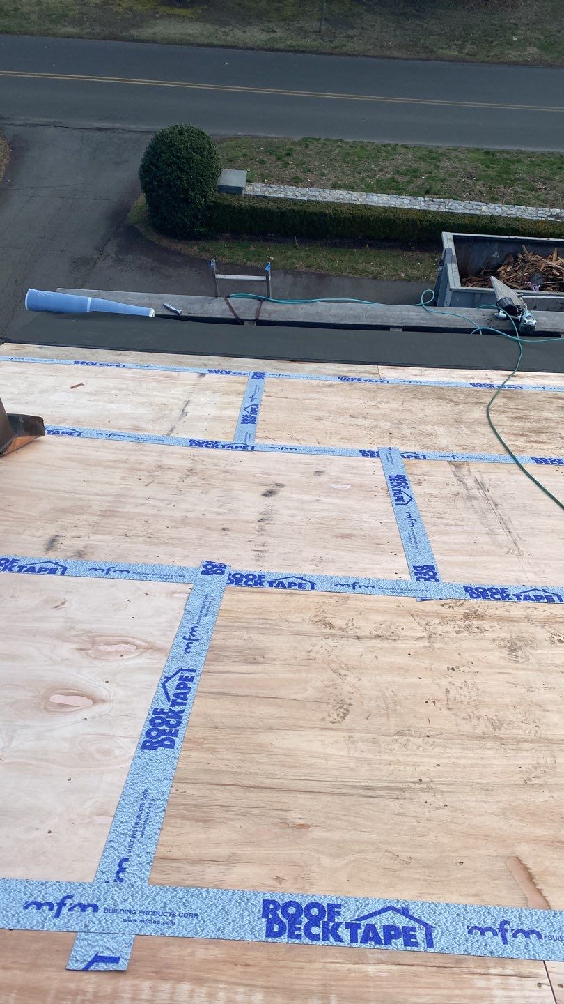 Residential Roofing Installation using Vermont Slate by A Plus Exterior