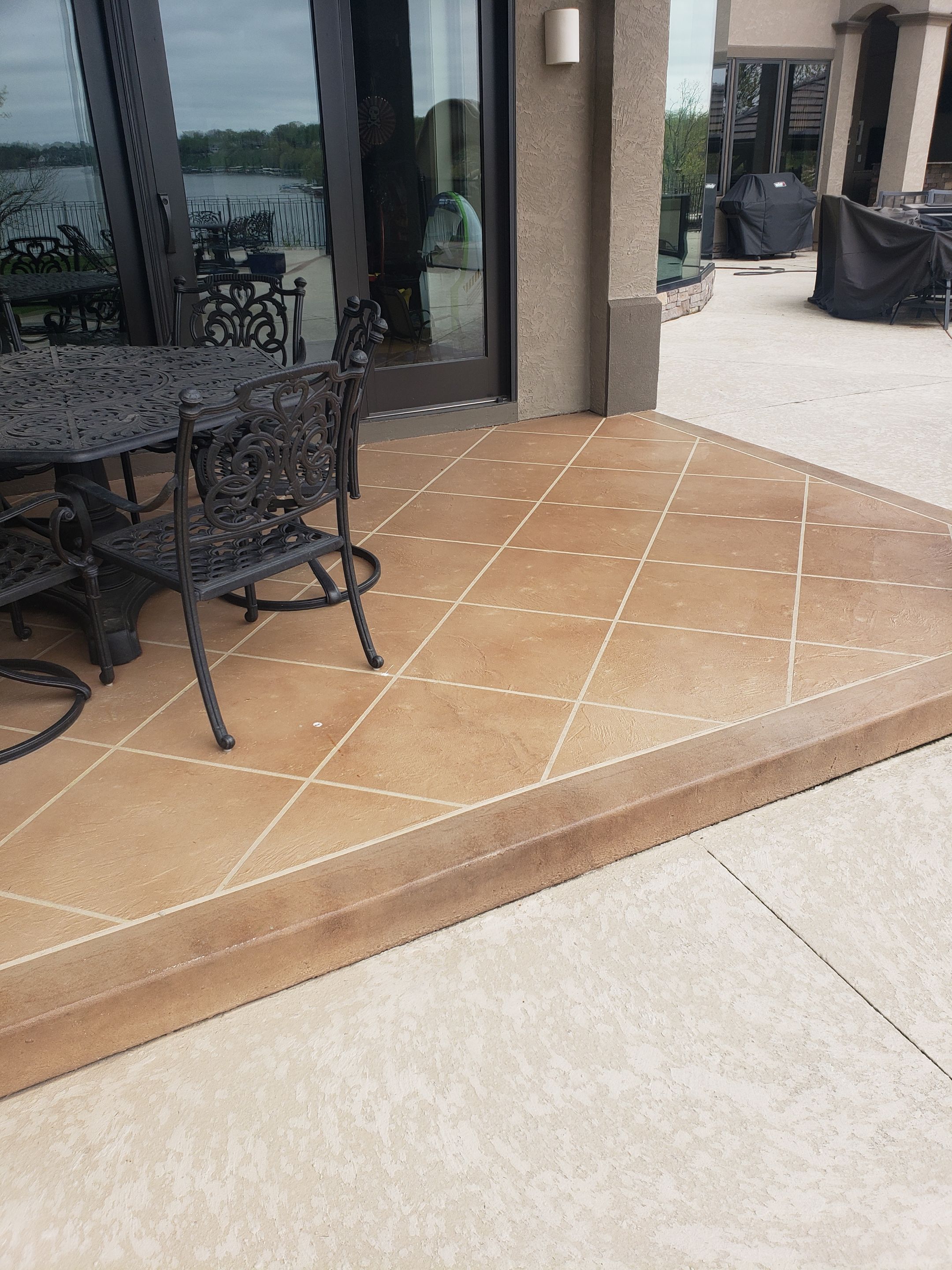 Lake Lotawana -- Front Walkway and Back Patio Tuscan Overlay by Big Red Decorative Concrete, LLC