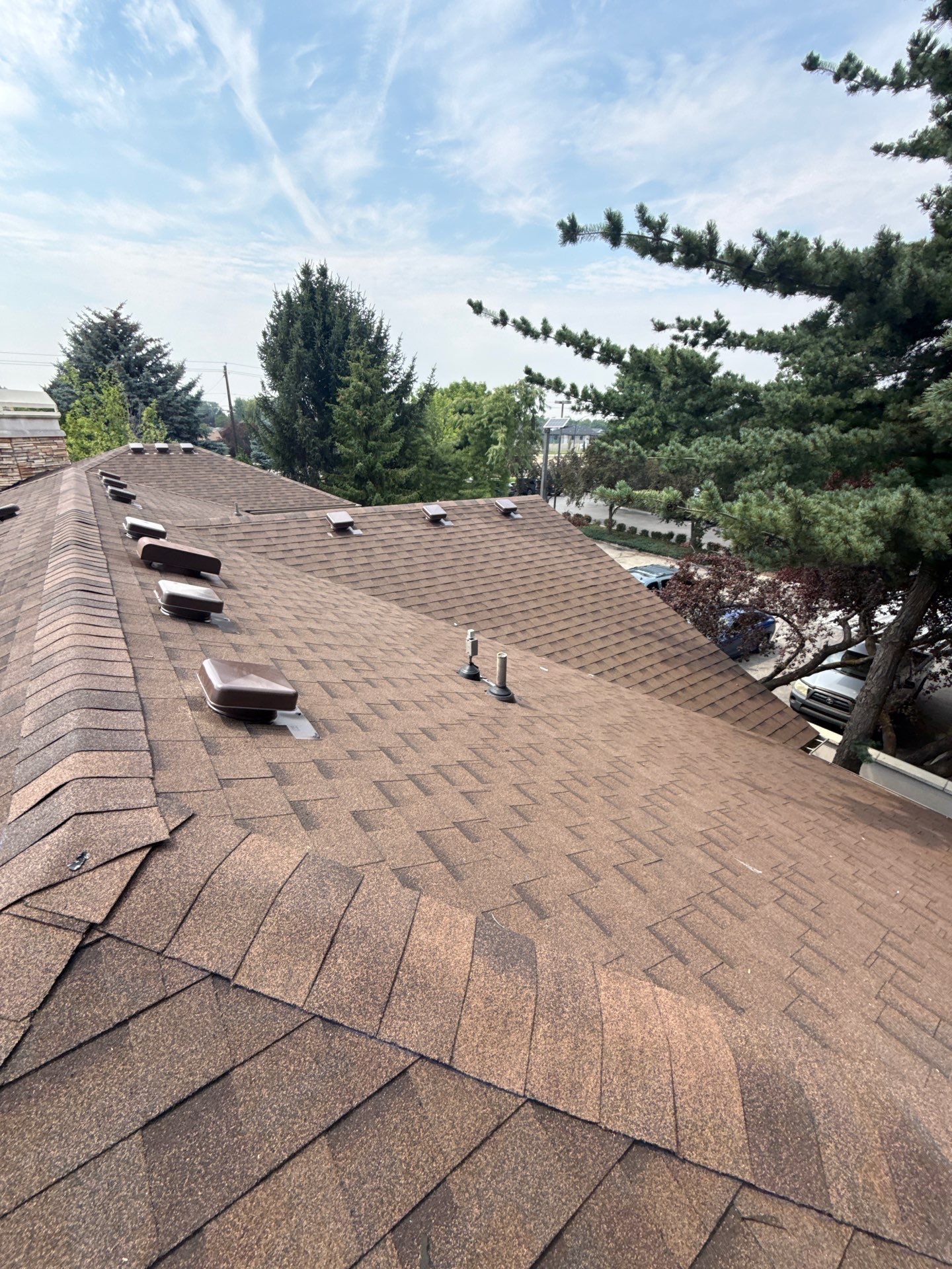 Boise Commercial Roof Replacement with Brown Architectural Shingles by Olive Roofing
