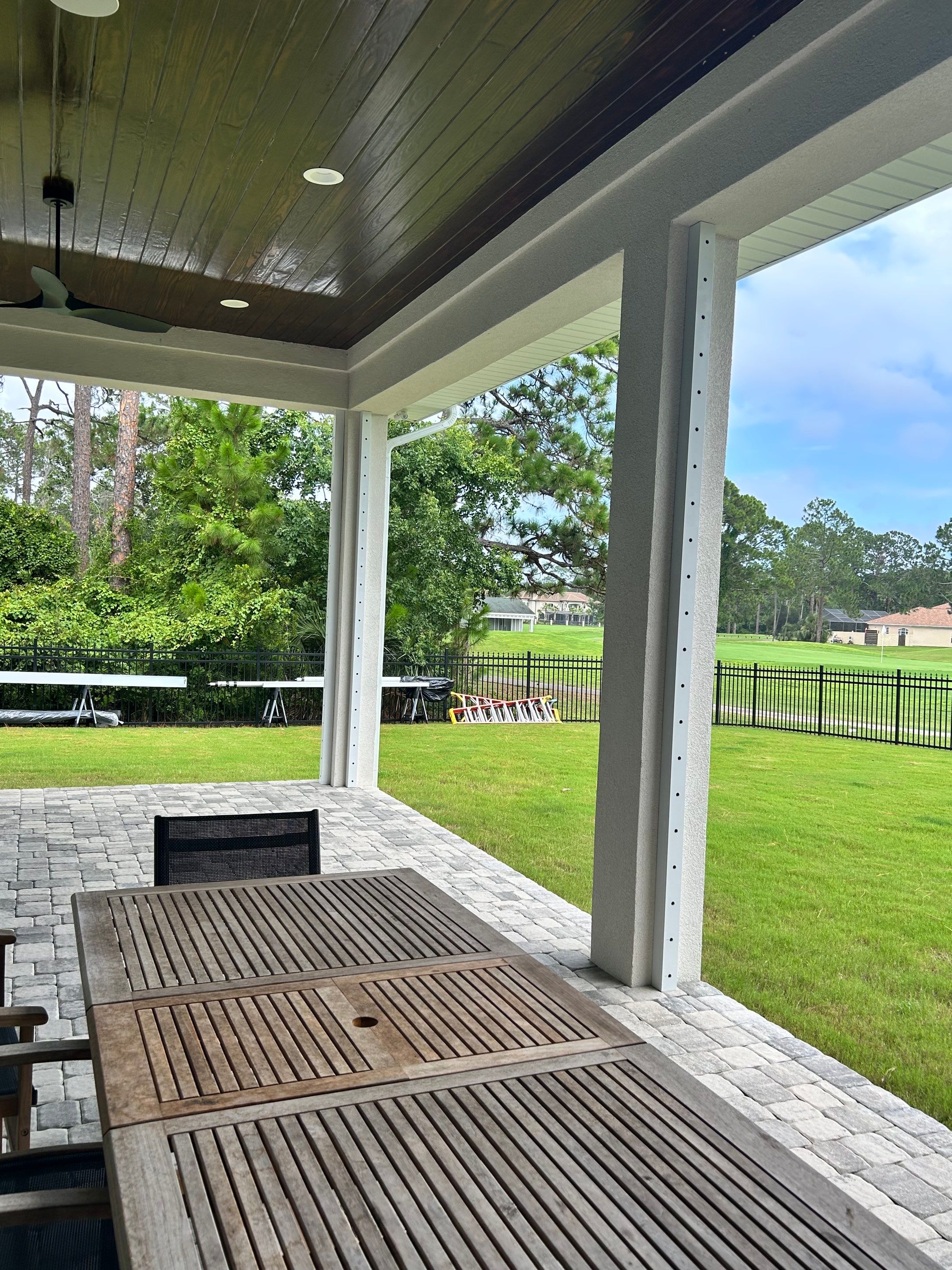 Motorized Screen and Solar Shade Installation in Panama City Beach by Brannan Aluminum Inc.