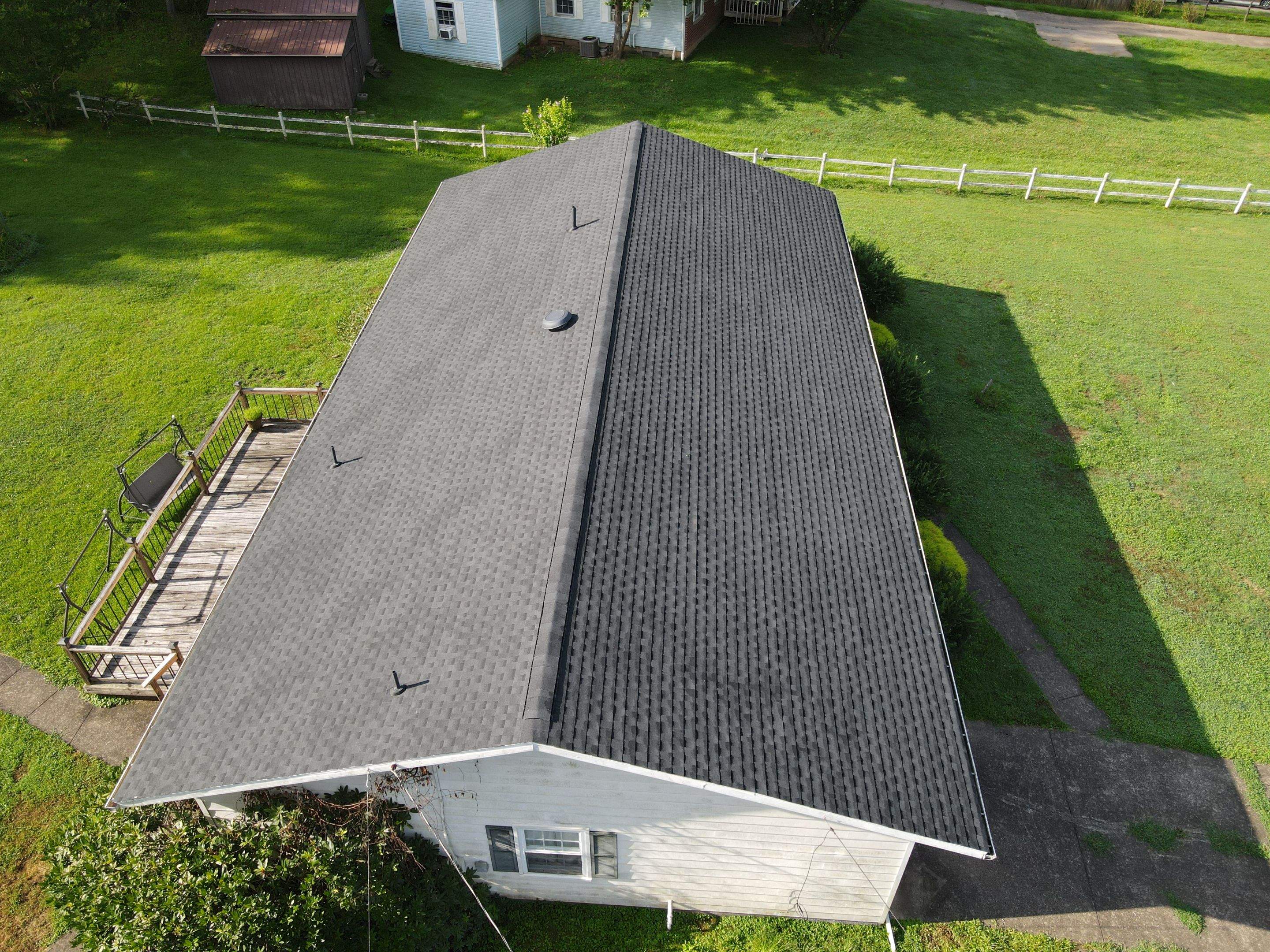 Residential Roofing Installation using GAF Timberline HDZ Charcoal by Rainstoppers Roofing