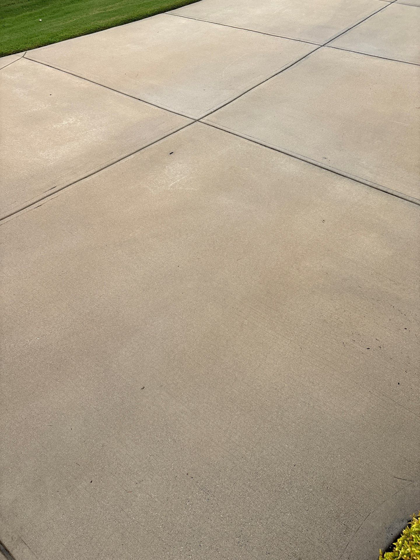 Concrete Driveway, Wood Playset using Wood Sealant and Concrete Sealant by DuraSeal