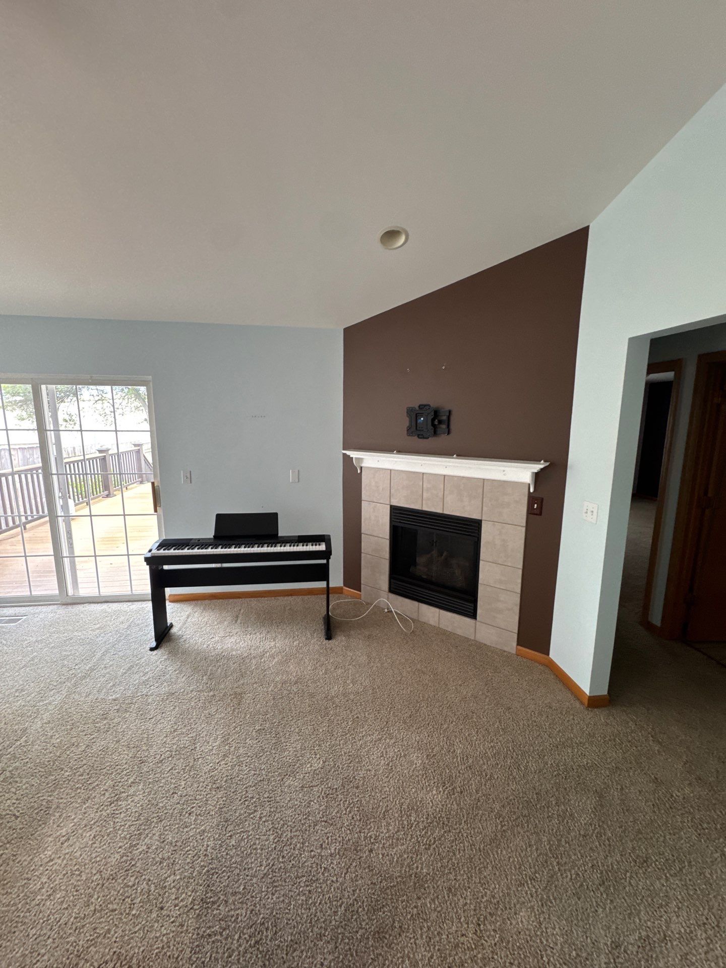 Living Room Wallpaper Removal and Interior Painting by OCS Contracting Services