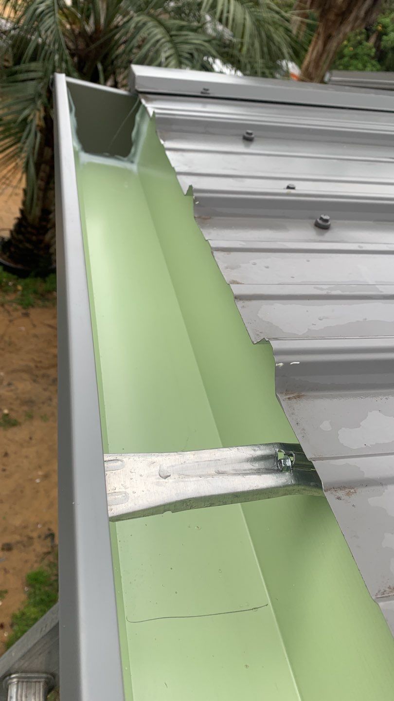 Seamless Gutter Installation using Charcoal Grey Gutters by Gutter Professors