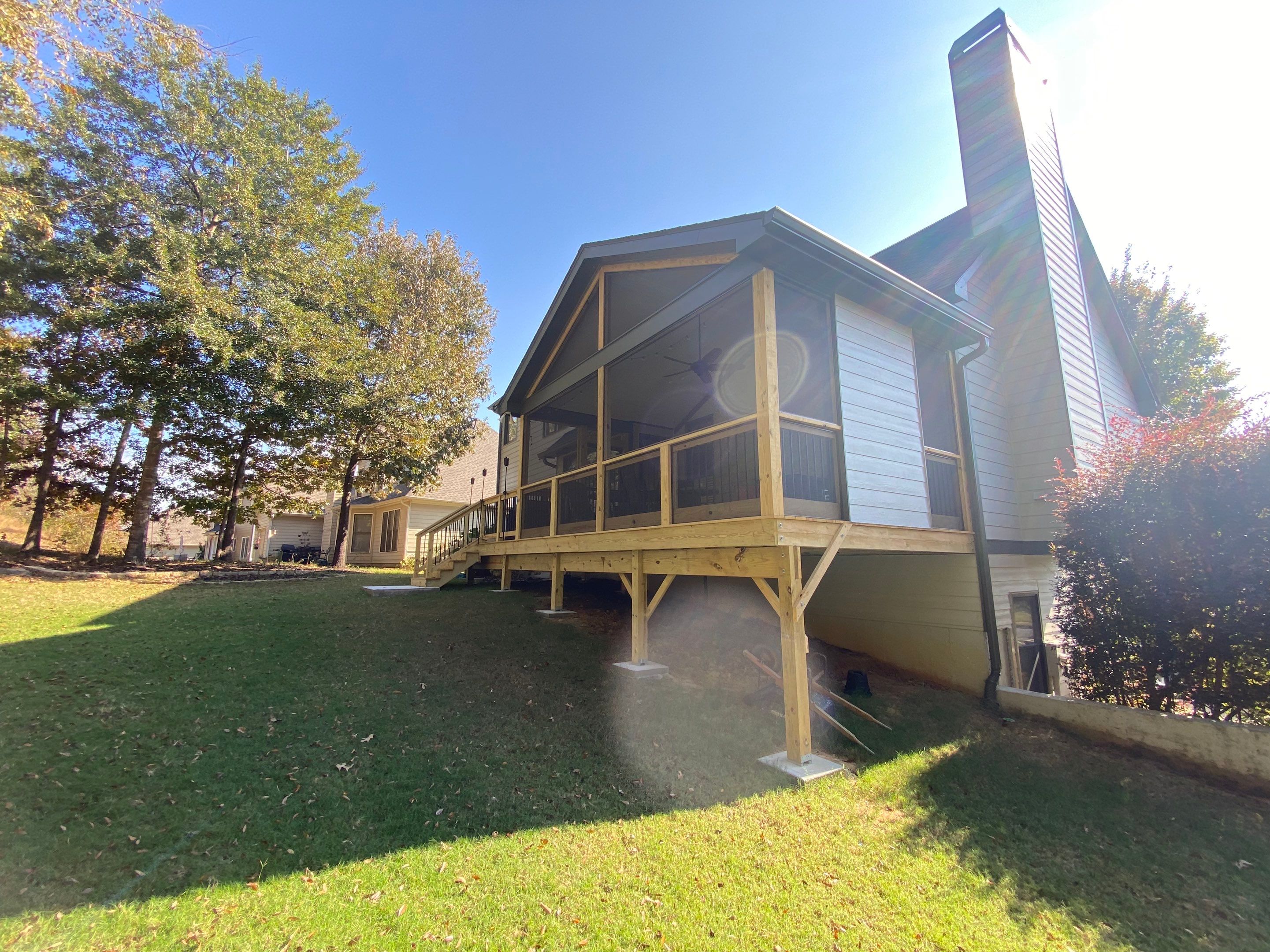 Custom Screened Porch Addition and Wood Deck in Acworth by Swift Home Renovations