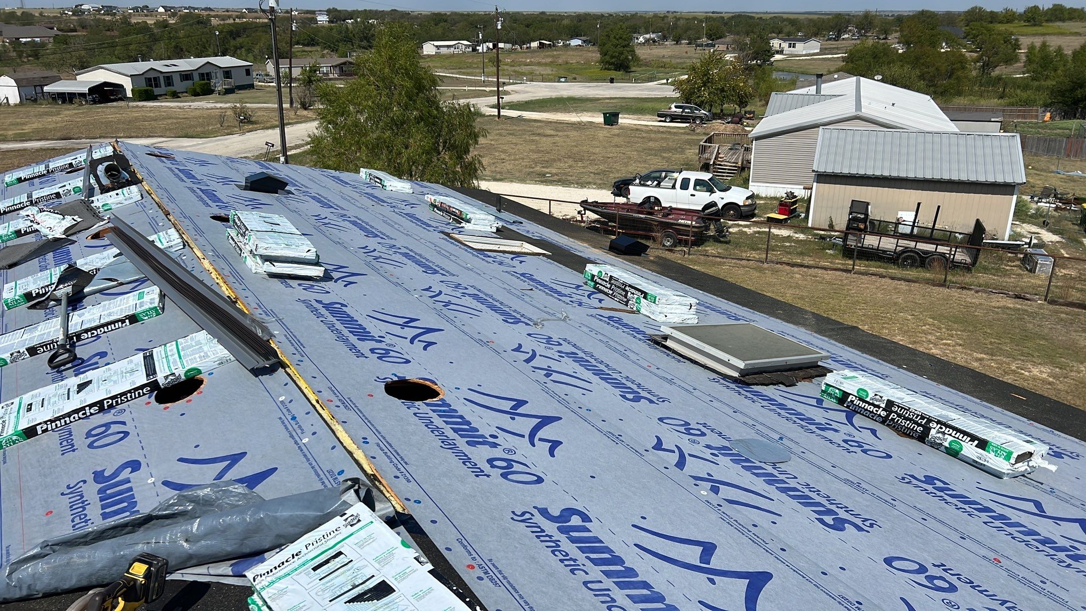 Residential Roofing Installation using ATLAS Pinnacle Pristine Shingles by Harvey Roofing & Construction