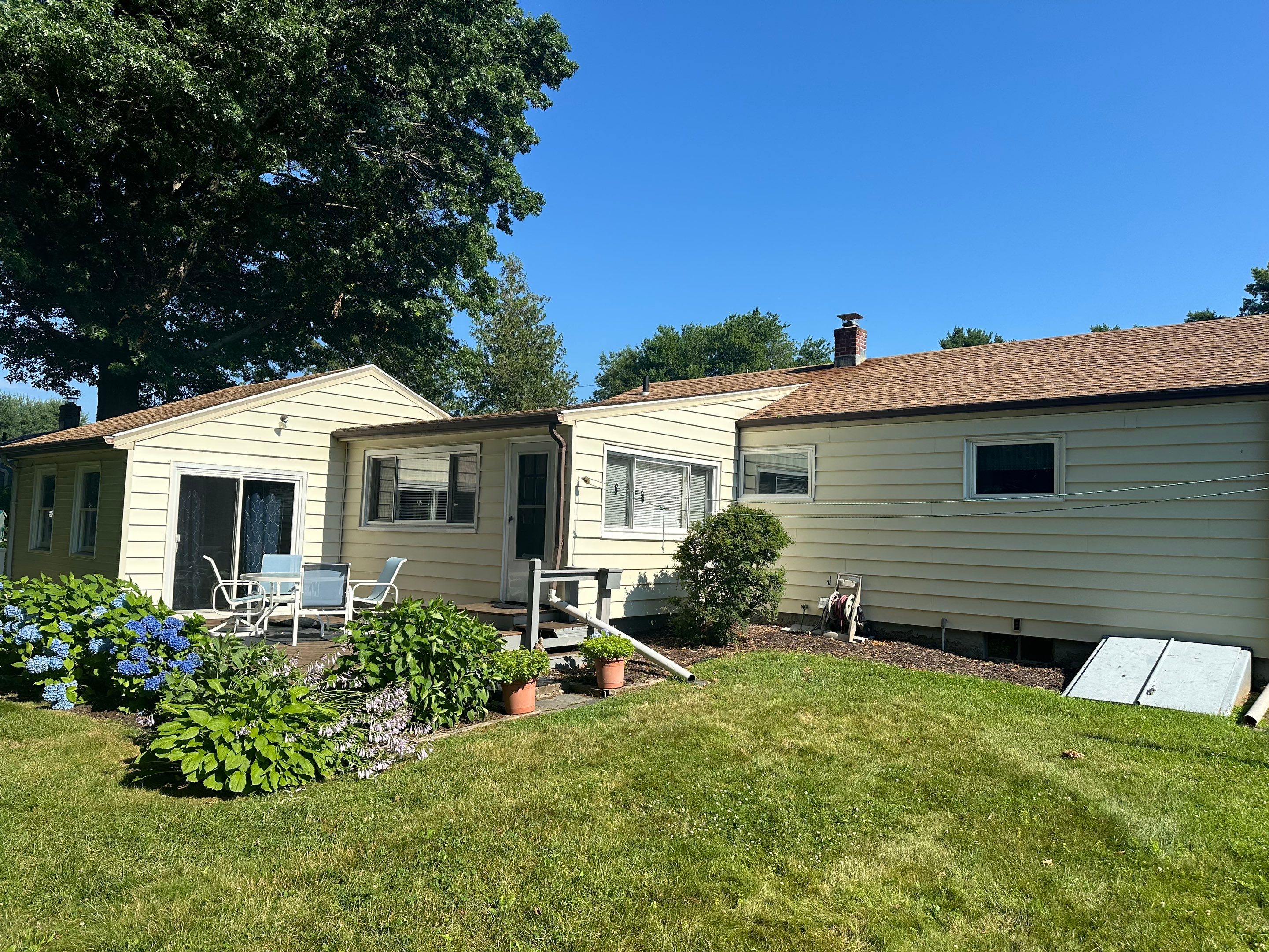 Siding Installation using Clapboard Monogram D4 Cypress by A Plus Exterior