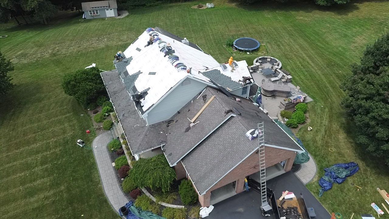 Full Roofing Replacement and Gray Shake Hardie Siding Installation in Butler by Cousins Roofing Siding & Decks