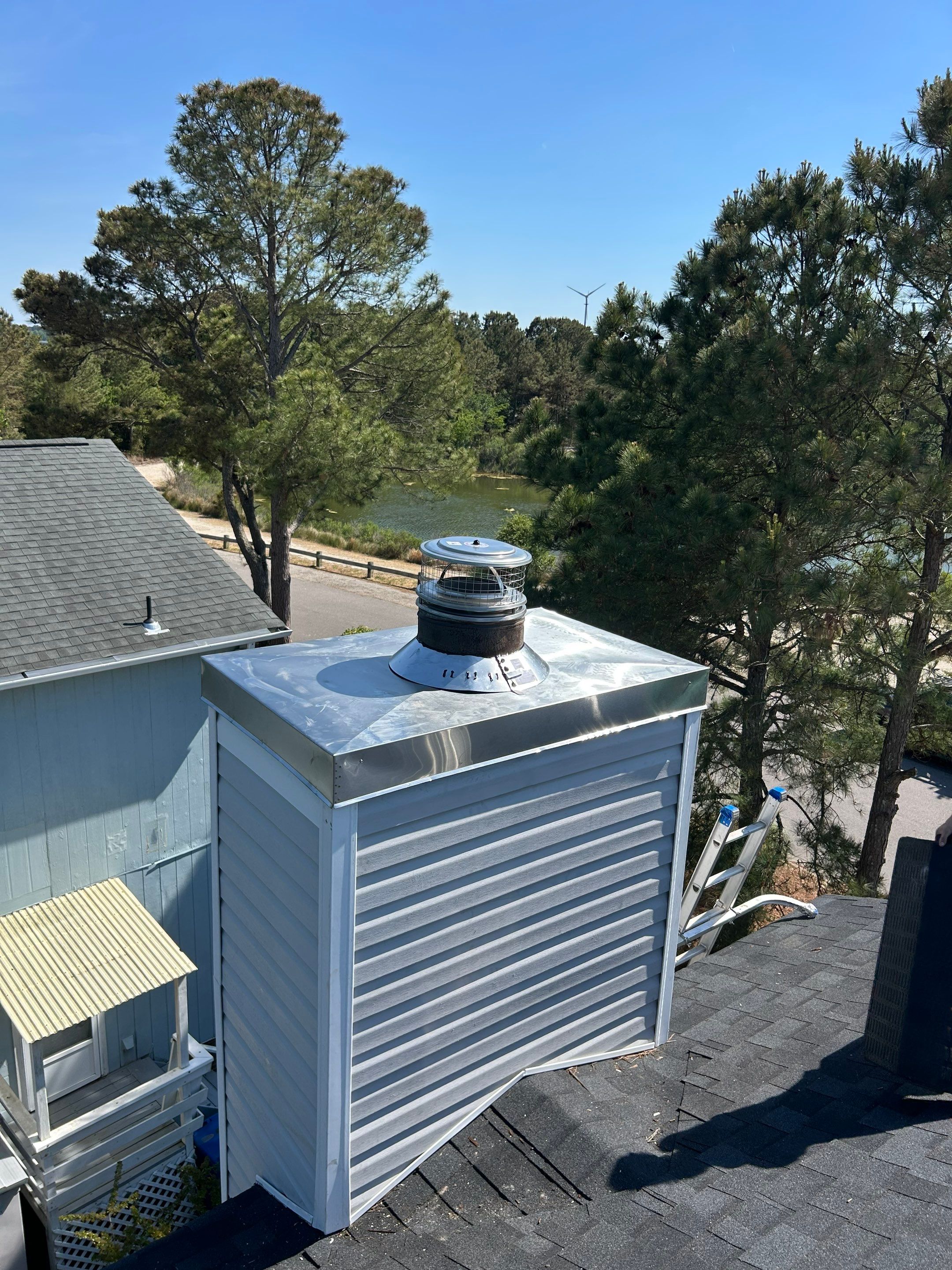 Chimney Leak Repair - Chase Cover, Cap, and Siding by Premier Chimney and Roofing