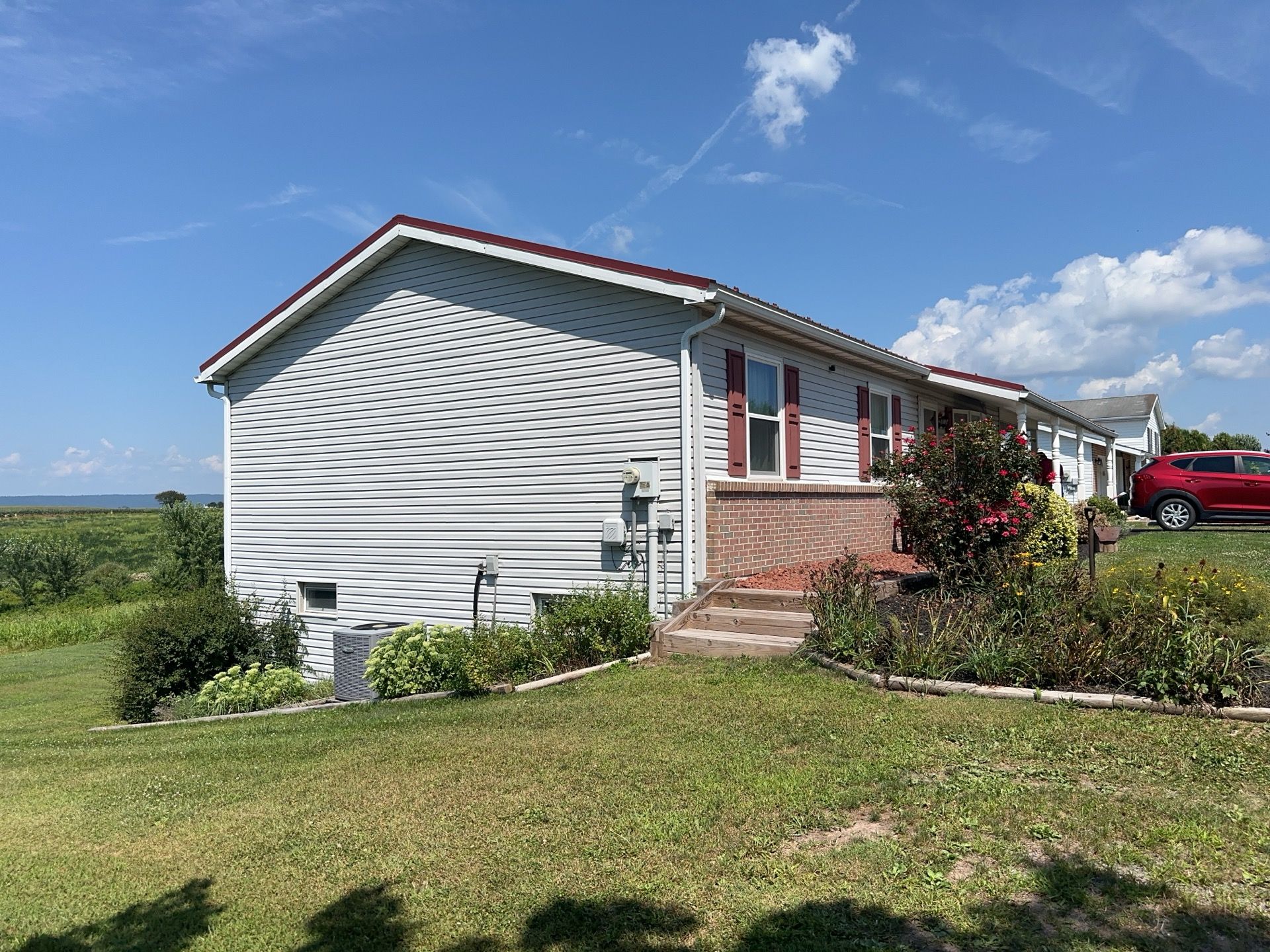 Vinyl Siding Replacement and Patio Door Installation in Elizabethville by Esh Builders