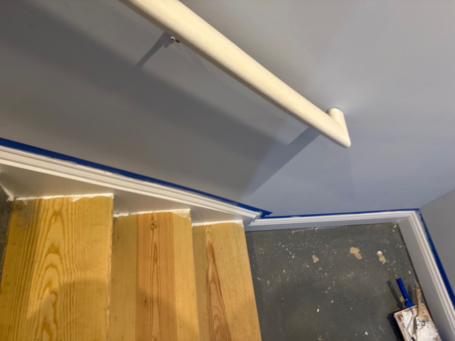 Stairway Installation using t vinyl stair tread and reversibleriser by La Bendicion Contruction Llc
