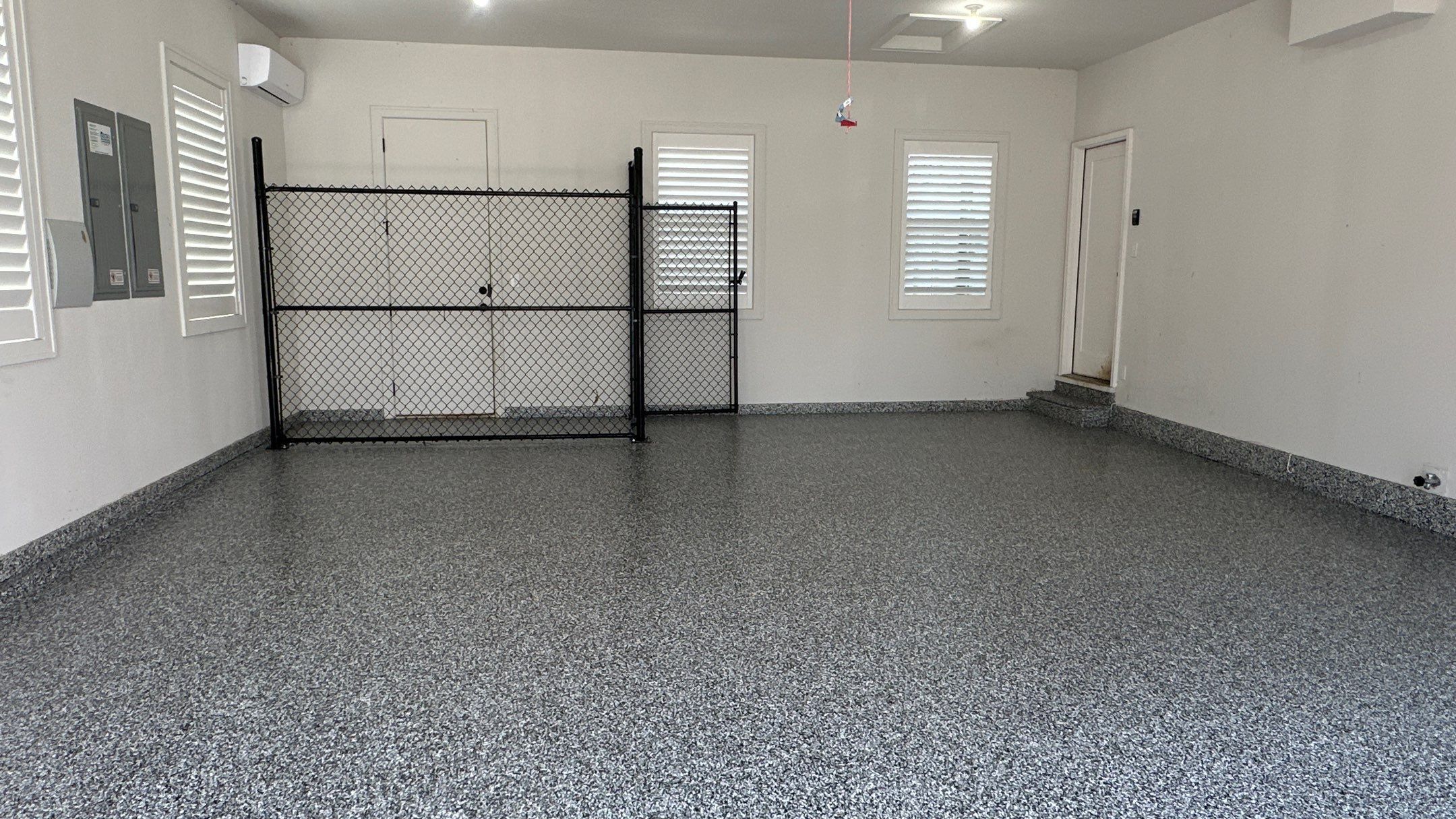 Jim E. went with a beautiful Banner Flake floor  by Banner Garage