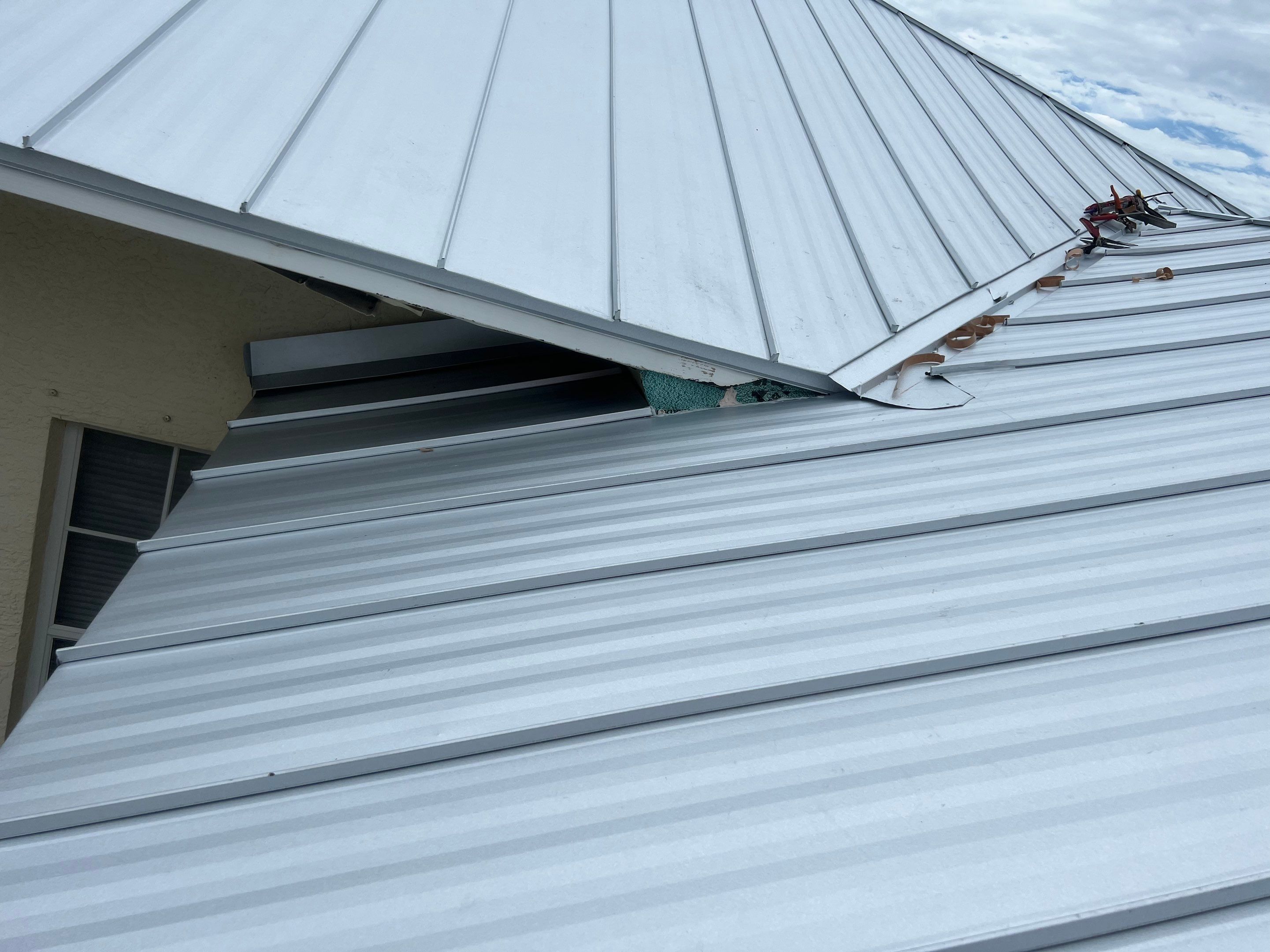 Residential Roofing Installation using Standing Seam Metal by Protek Roofing Heating Air & Solar