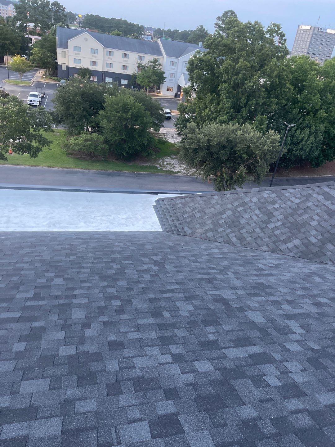 Commercial Roofing Installation using Roof Replacement by American Roofing & Construction LLC