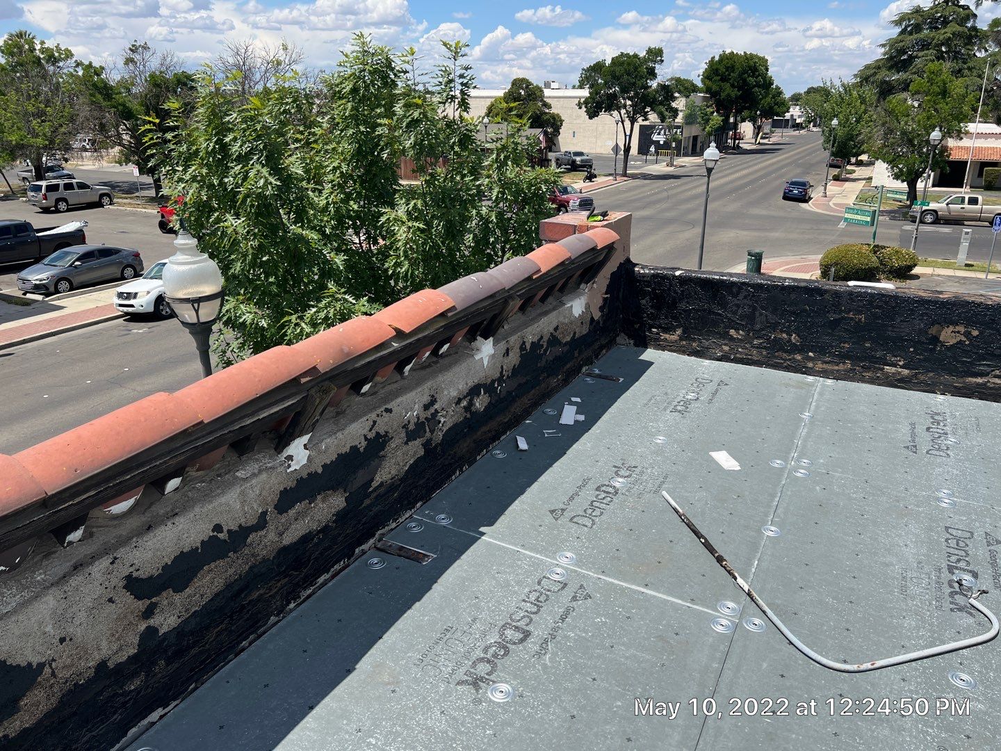 Commercial Roofing Installation using Conklin BenchPly system with PUMA top coat (imbedded fabric system) by Straight Edge Roofing Inc