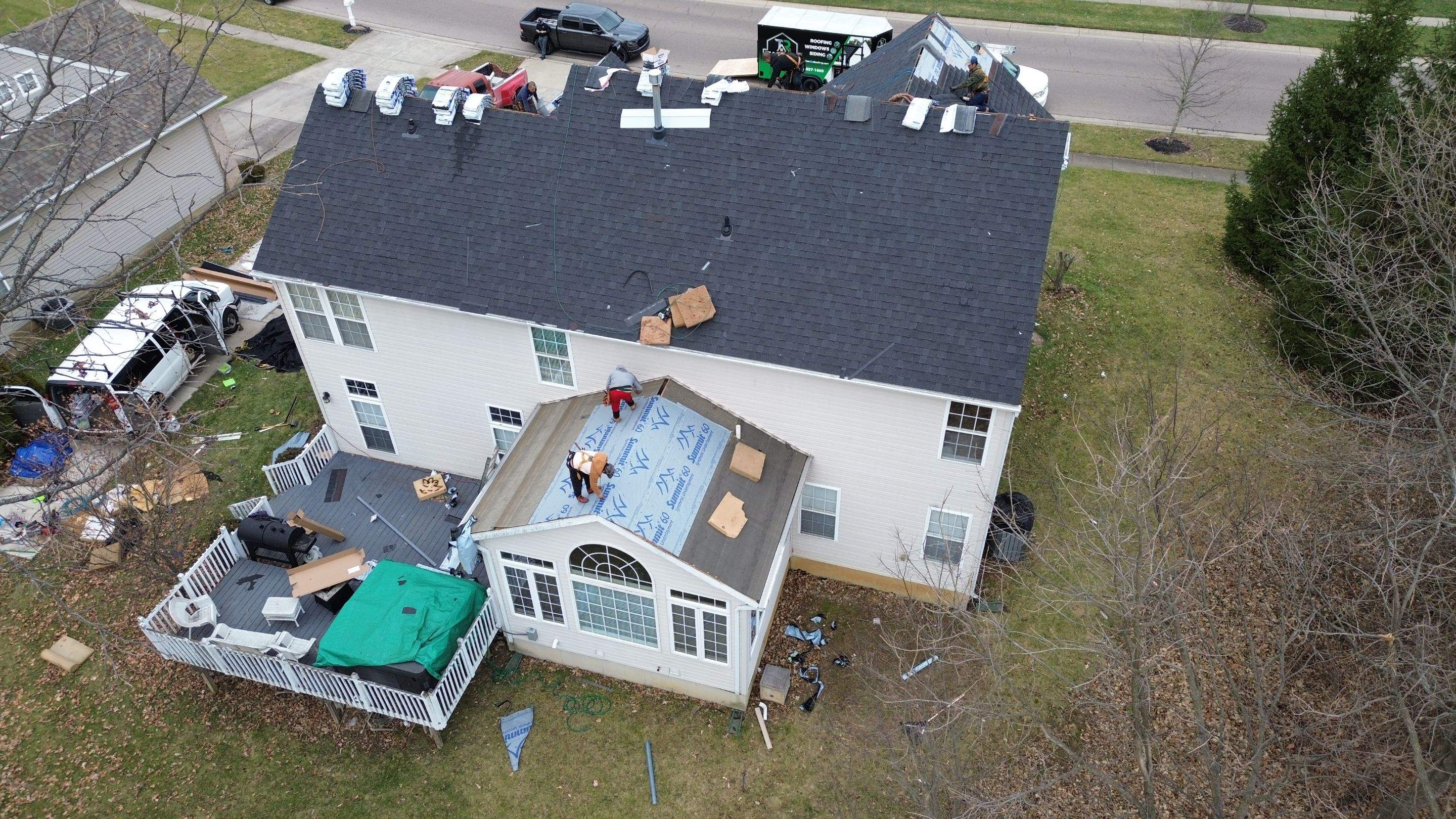 Walden Ponds - Pristine Black and Hydro Flo Gutter Guards by Tamlin Roofing