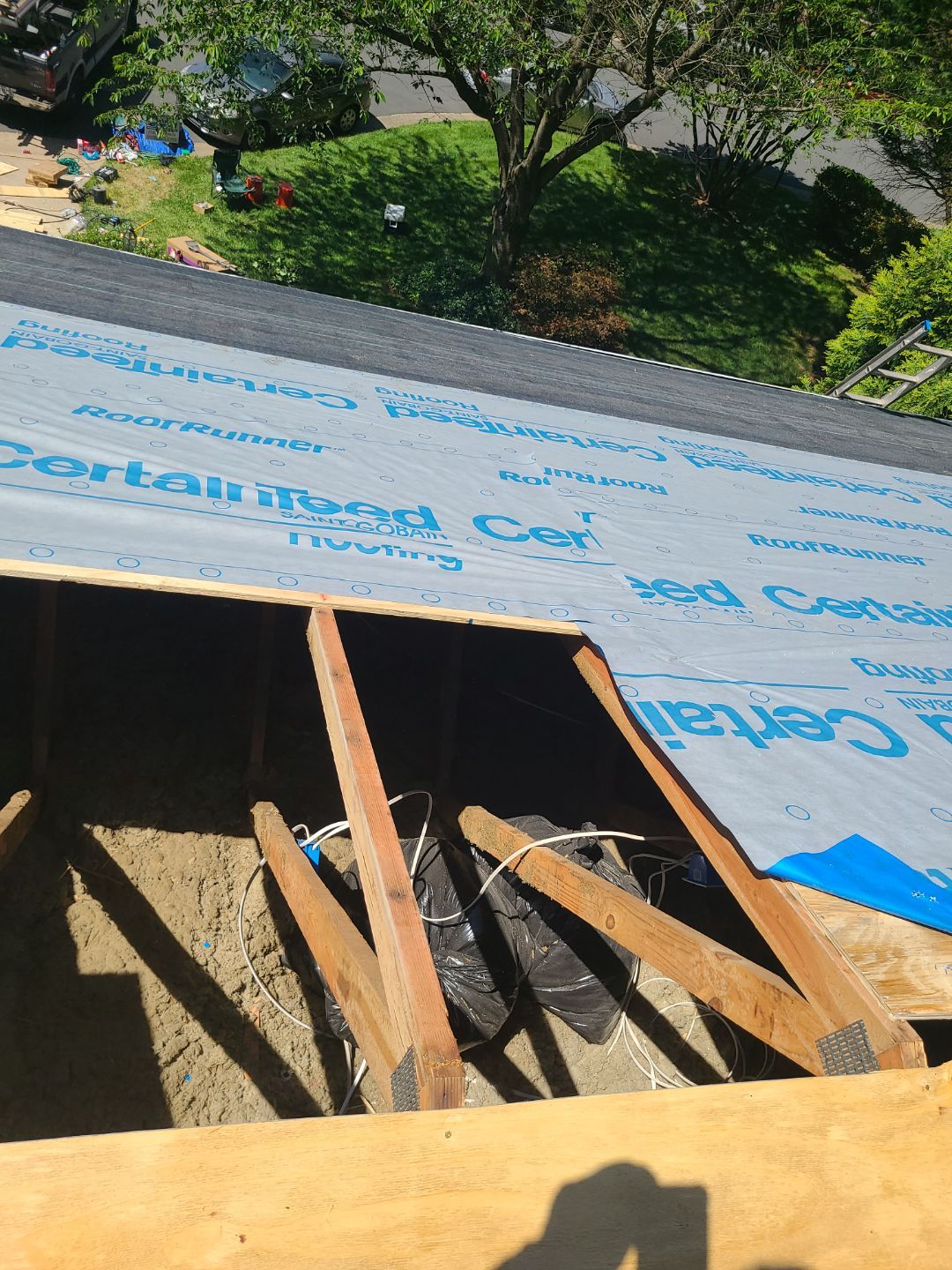 Burke: CertainTeed Landmark Designer Shingles in Moire Black by RM Banning, Inc.