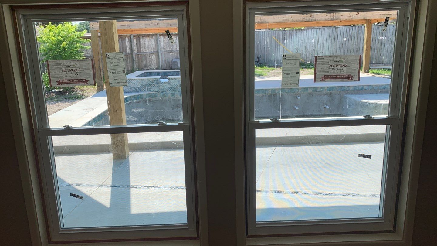 Beautiful pool side build by Bayfront Roofing and Construction