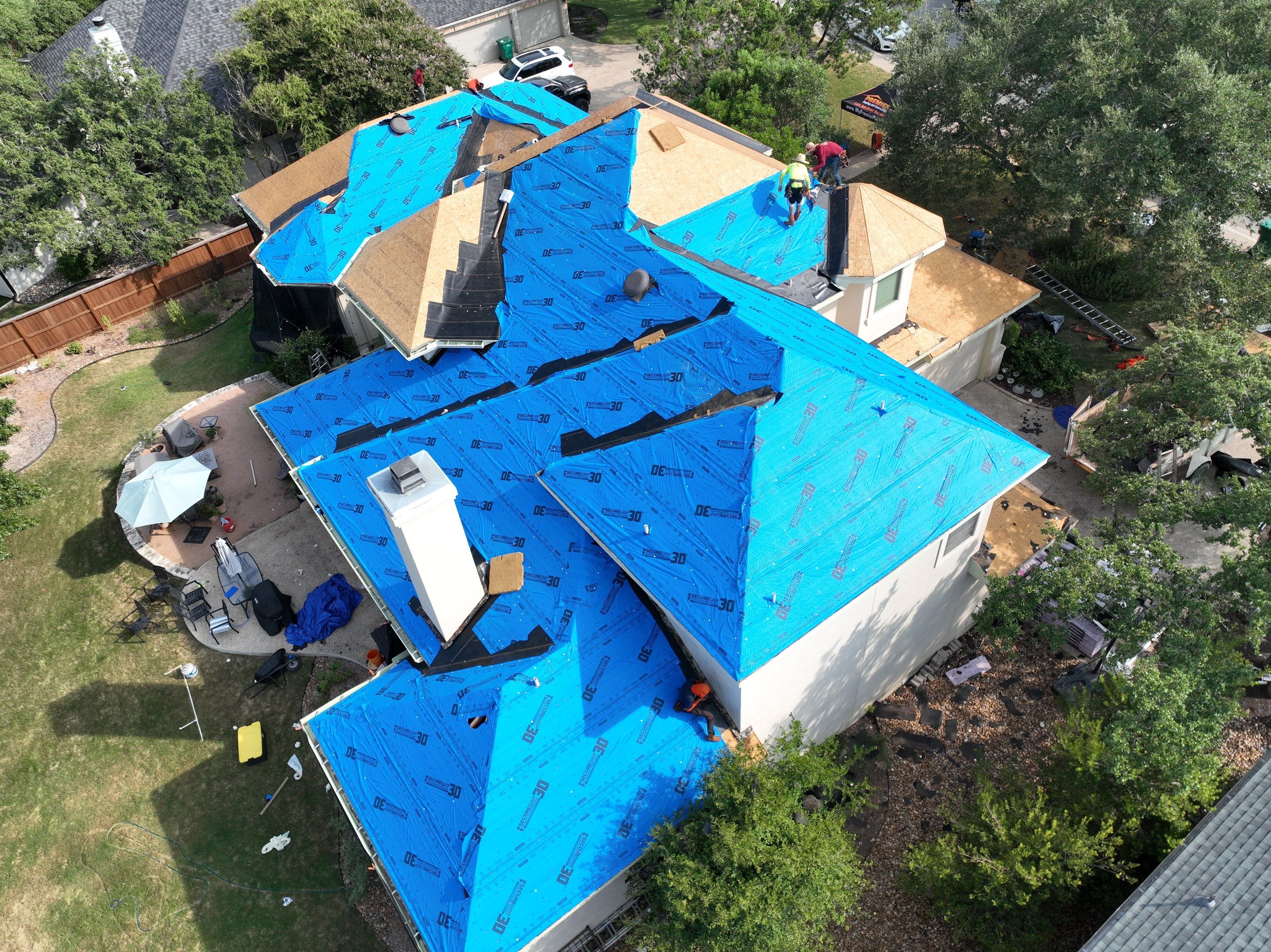 Residential Roof Replacement using 30 Year Laminate Shingles with High Profile Ridge by Premier Roofing and Contracting