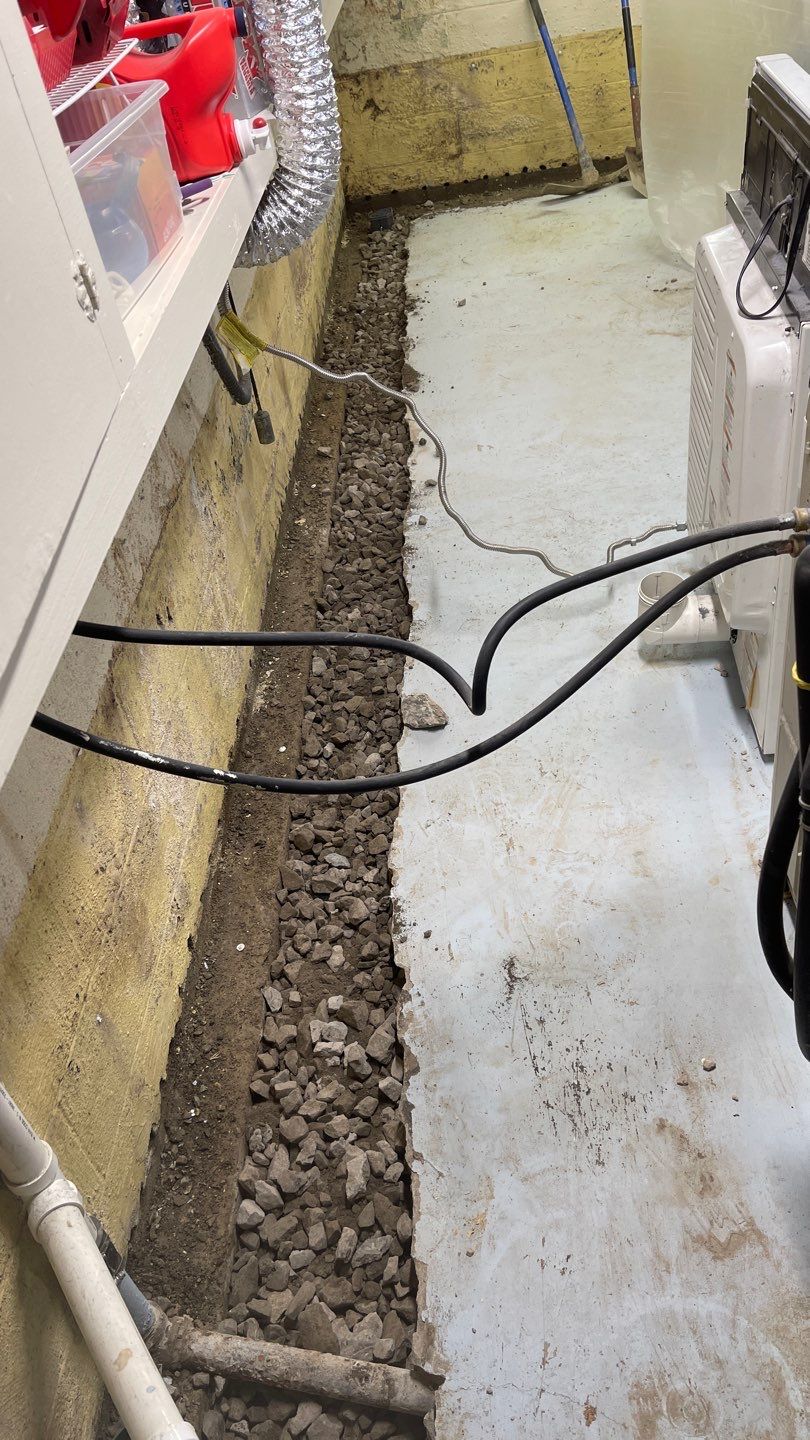 Interior Waterproofing Using GrateDrain™ Products by Toledo Basement Repair 
