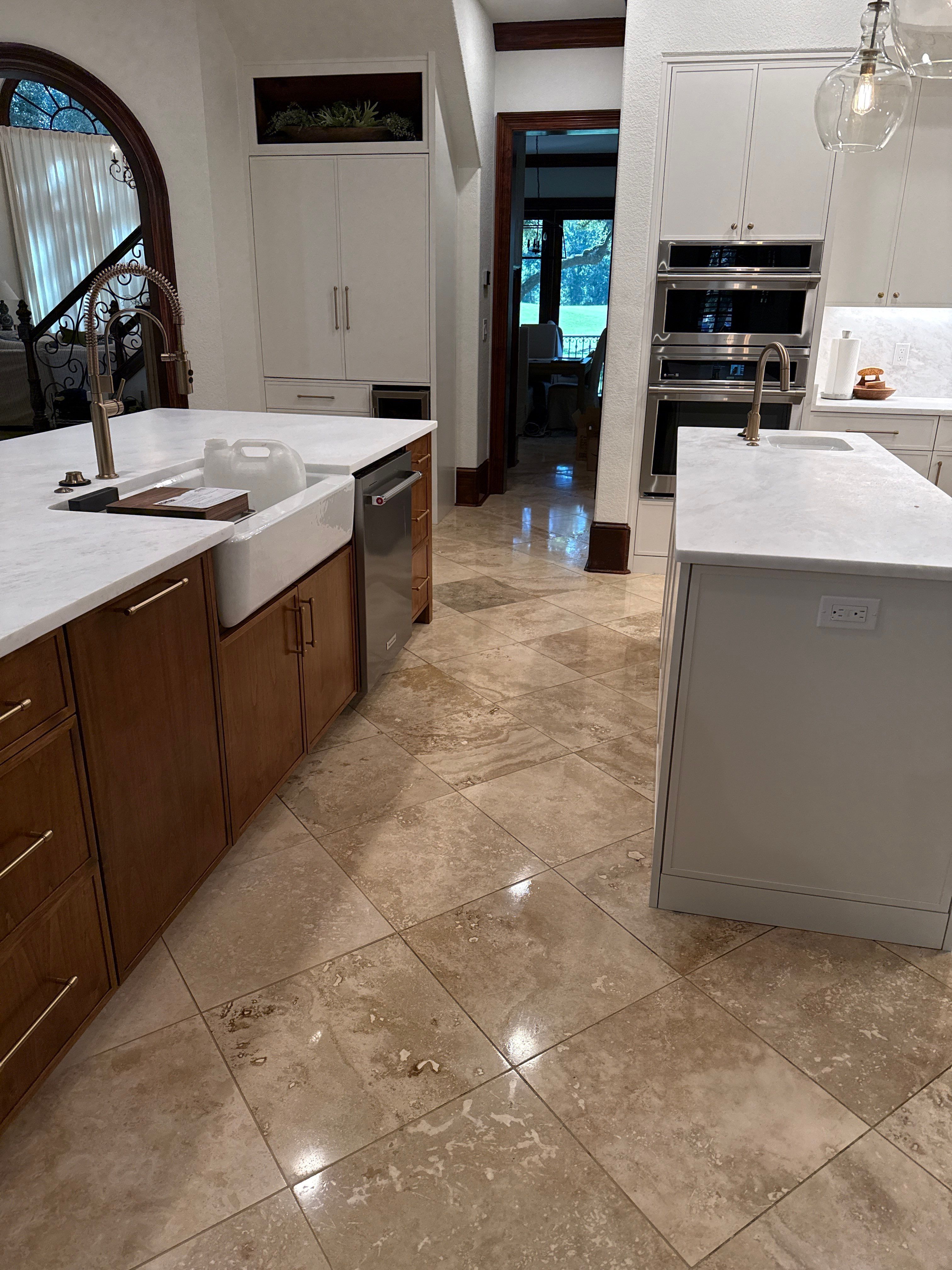 Polished Travertine Floor Restoration for Gulf Shores Residence by Cornerstone Hard Surface Restoration
