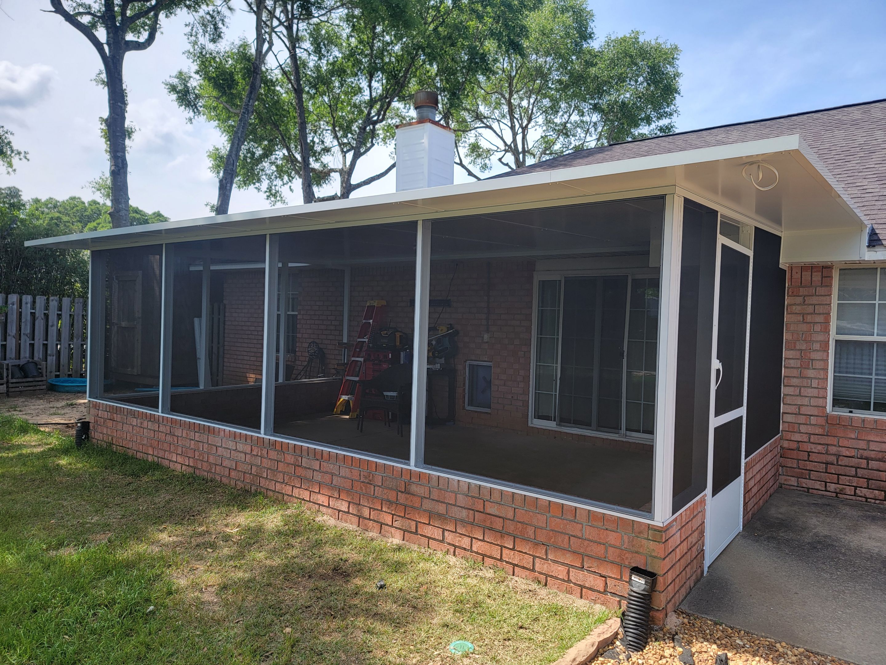 Screen Room in Milton w/Brick Kneewall by Titan Sunrooms