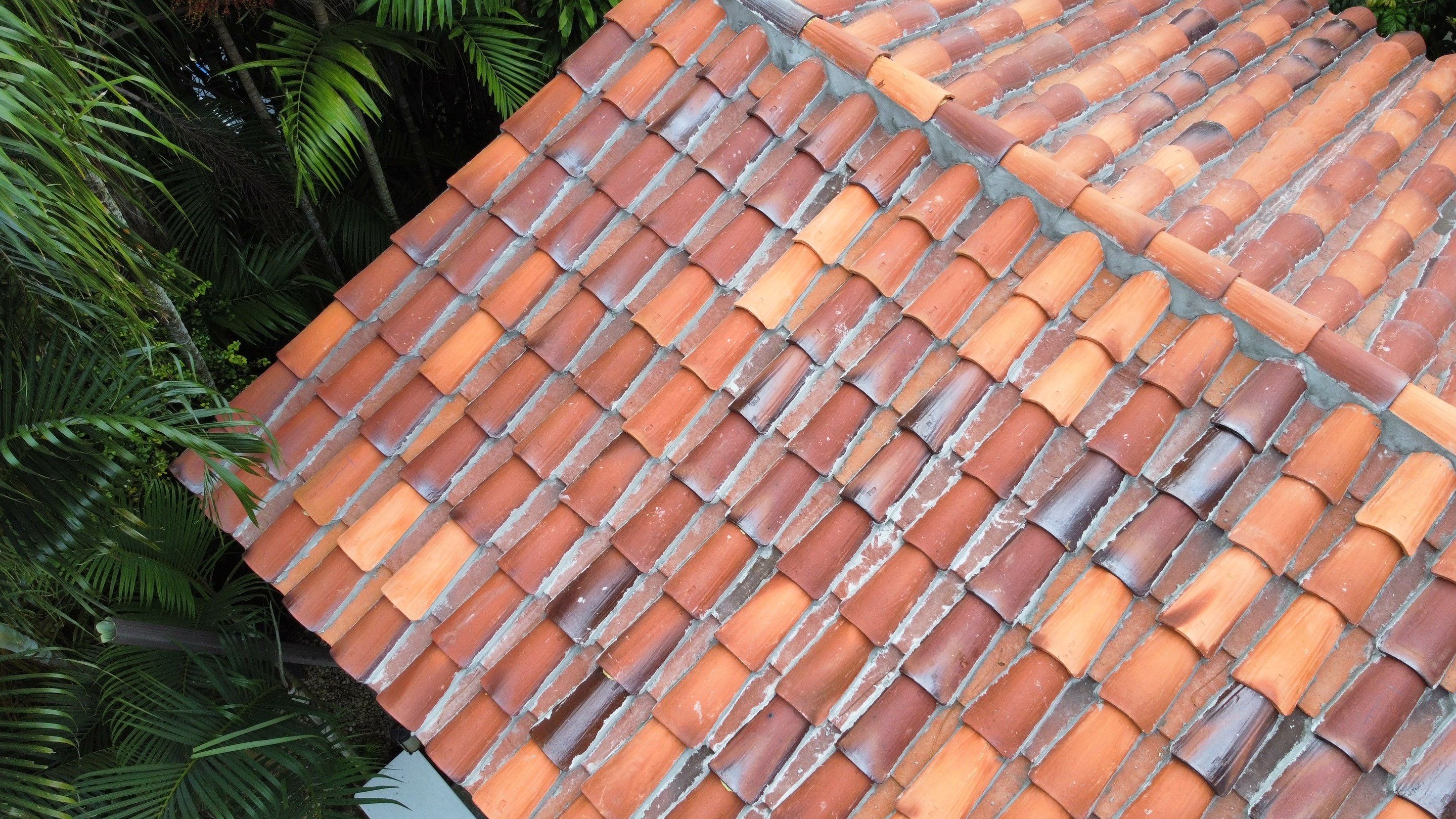 Residential Roofing Installation using Two Piece Clay Barrel Tile with a mortar set application by BOB HILSON & CO INC