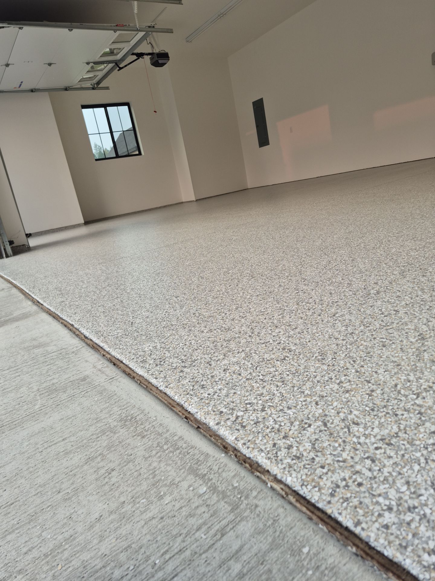 Garage Transformation using Mt Everest by Croc Coatings, LLC