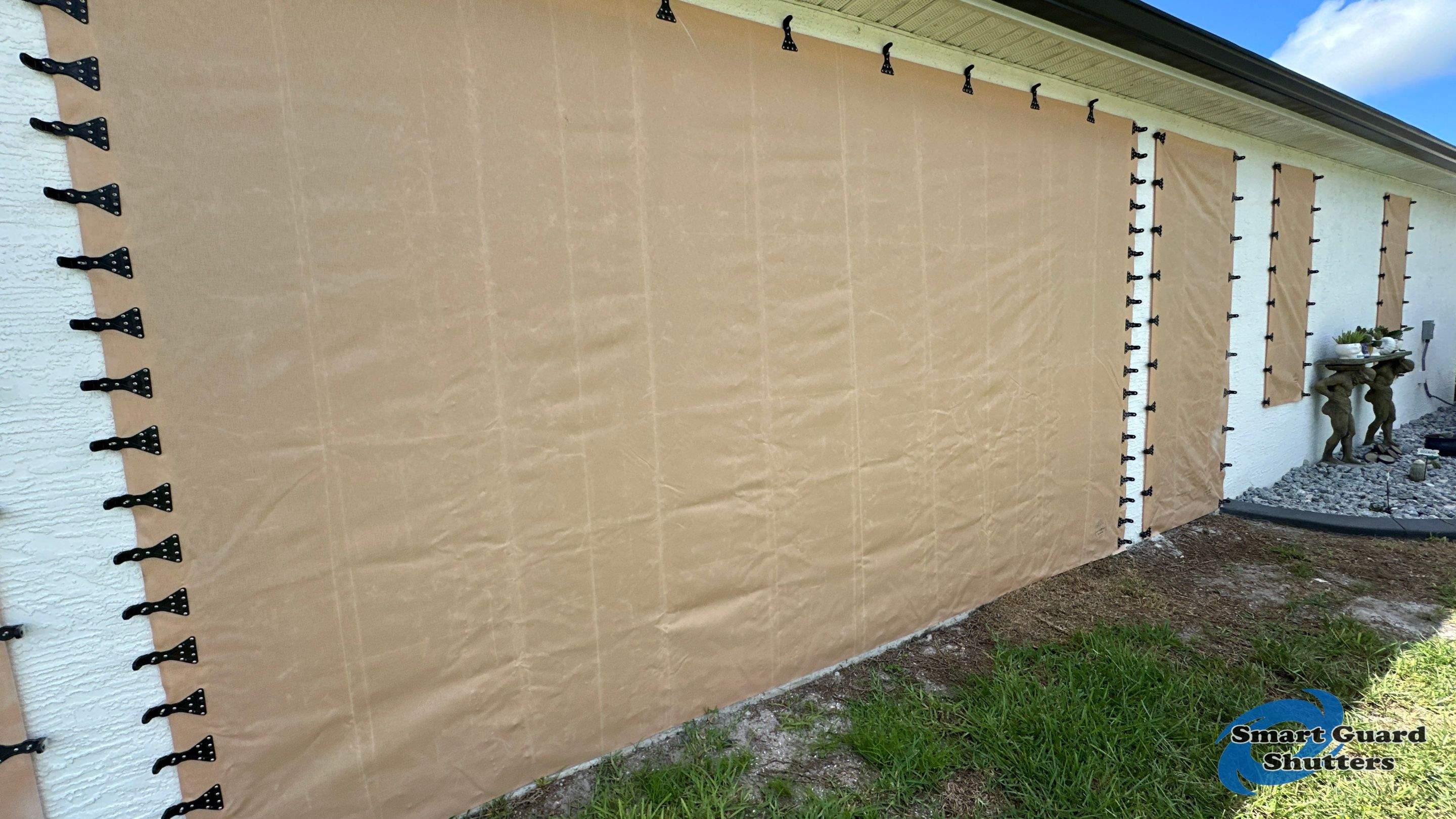 AstroGuard Hurricane Fabric in Tan by Smart Guard Shutters