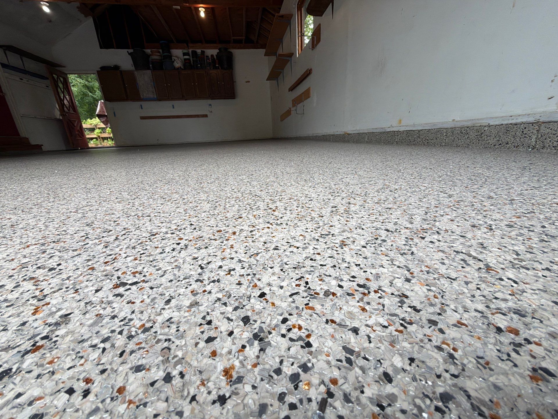 Vintage Goldmine Garage Coating by NG Masonry & Construction LLC