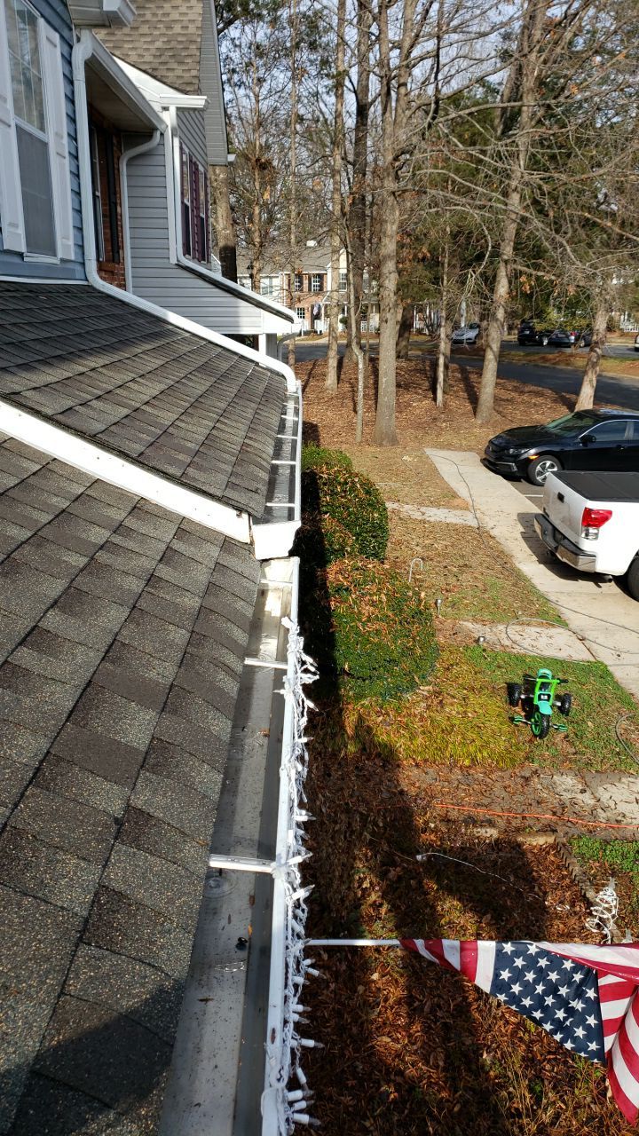 Gutter Cleaning using water by G&H Home Tech Pros LLC