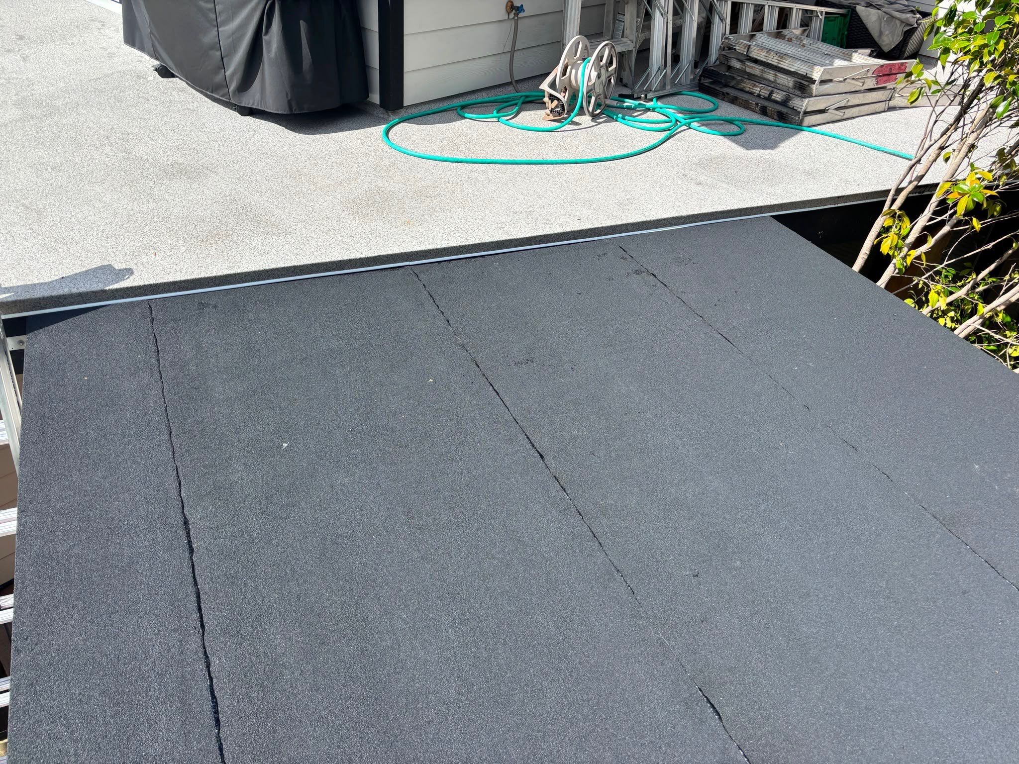 New Composite Deck with glass railing in North Vancouver by YVR Construction Group