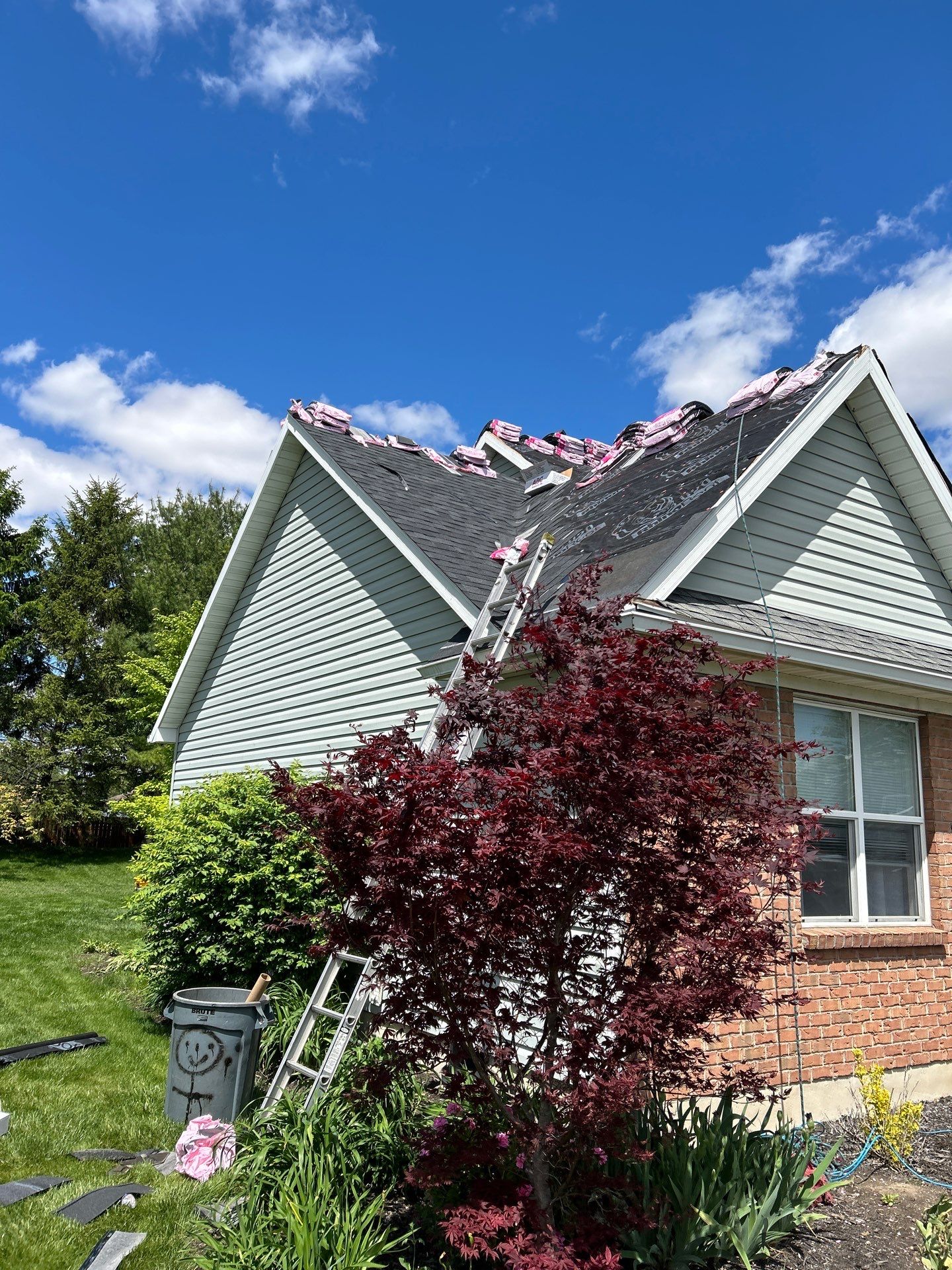 Exterior Installation using Onyx Black Durations and White Siding by WIW Enterprises Inc