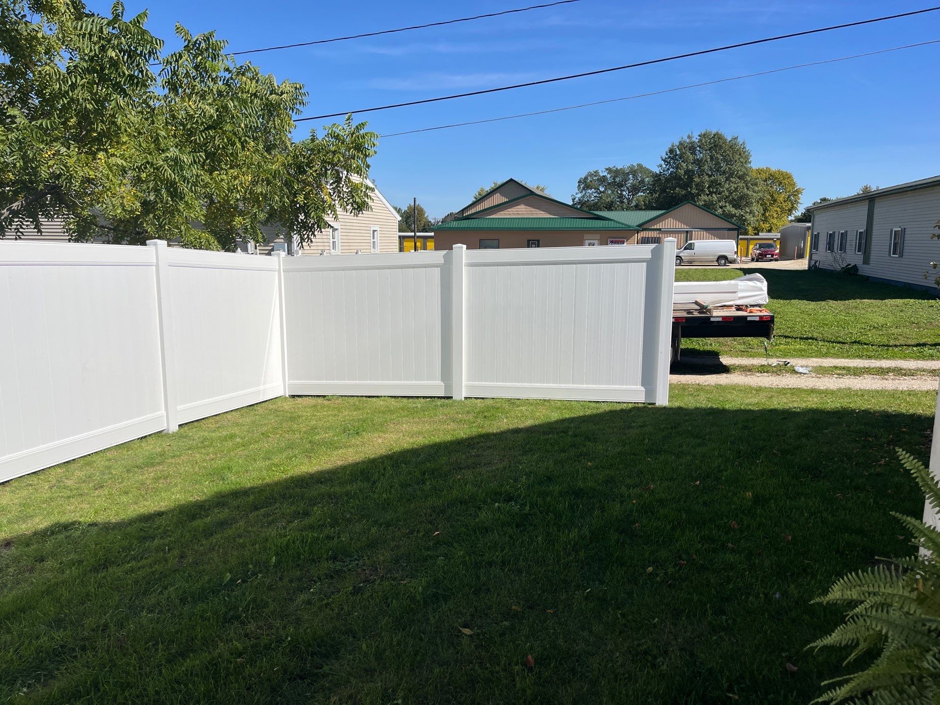 White Vinyl Privacy Fence Installation in Grundy Center by Perfect Picket Fence and Stain