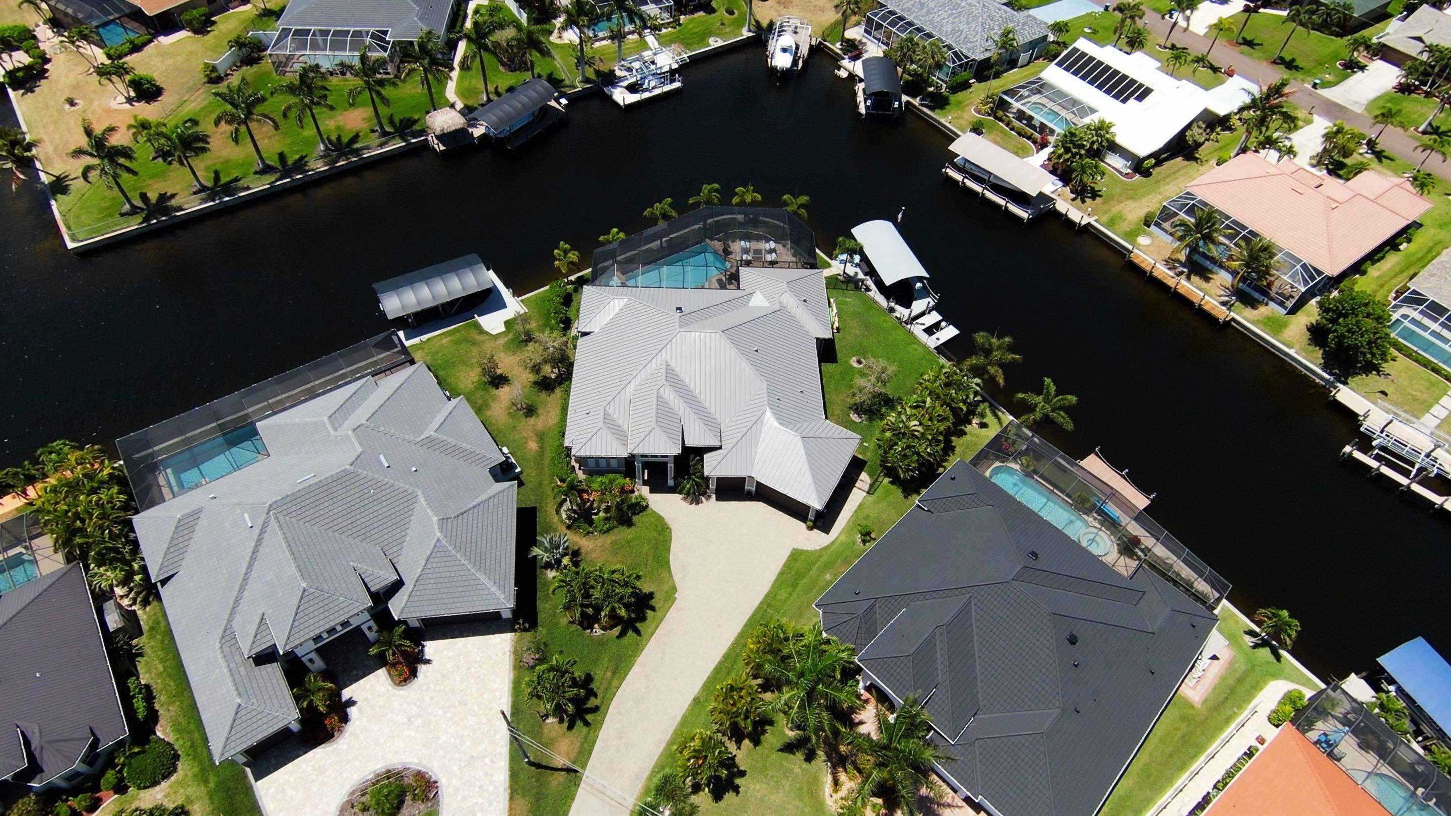 Residential Roofing Installation using Gulf Coast Metals Gulf Seam Panels by Four Peaks Roofing