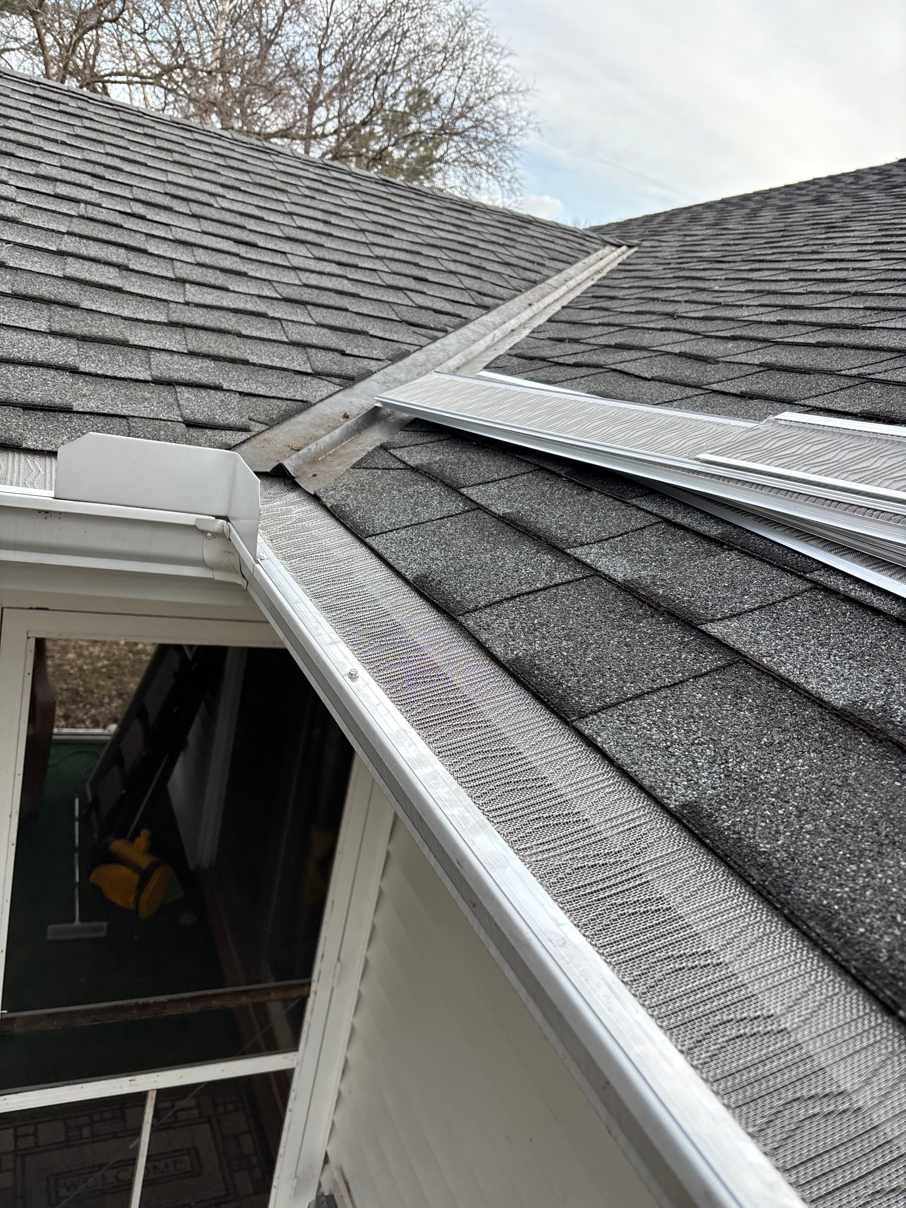 Minnetonka Gutter Cleaning and Leaf Blaster Pro Gutter Guard Installation by Next Level Seamless Gutters / Exteriors Inc.