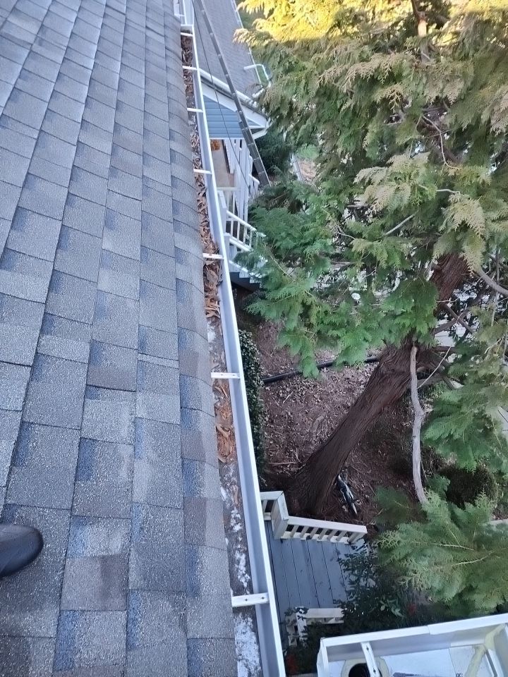 Gutter Cleaning using water by Power Wash Masters LLC