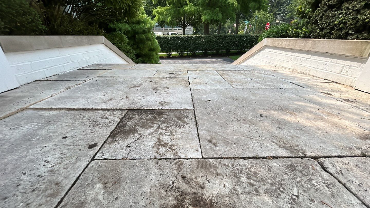 marble patio cleaning and sanding using Polysweep polymeric sand by Northern Power Washing LLC.