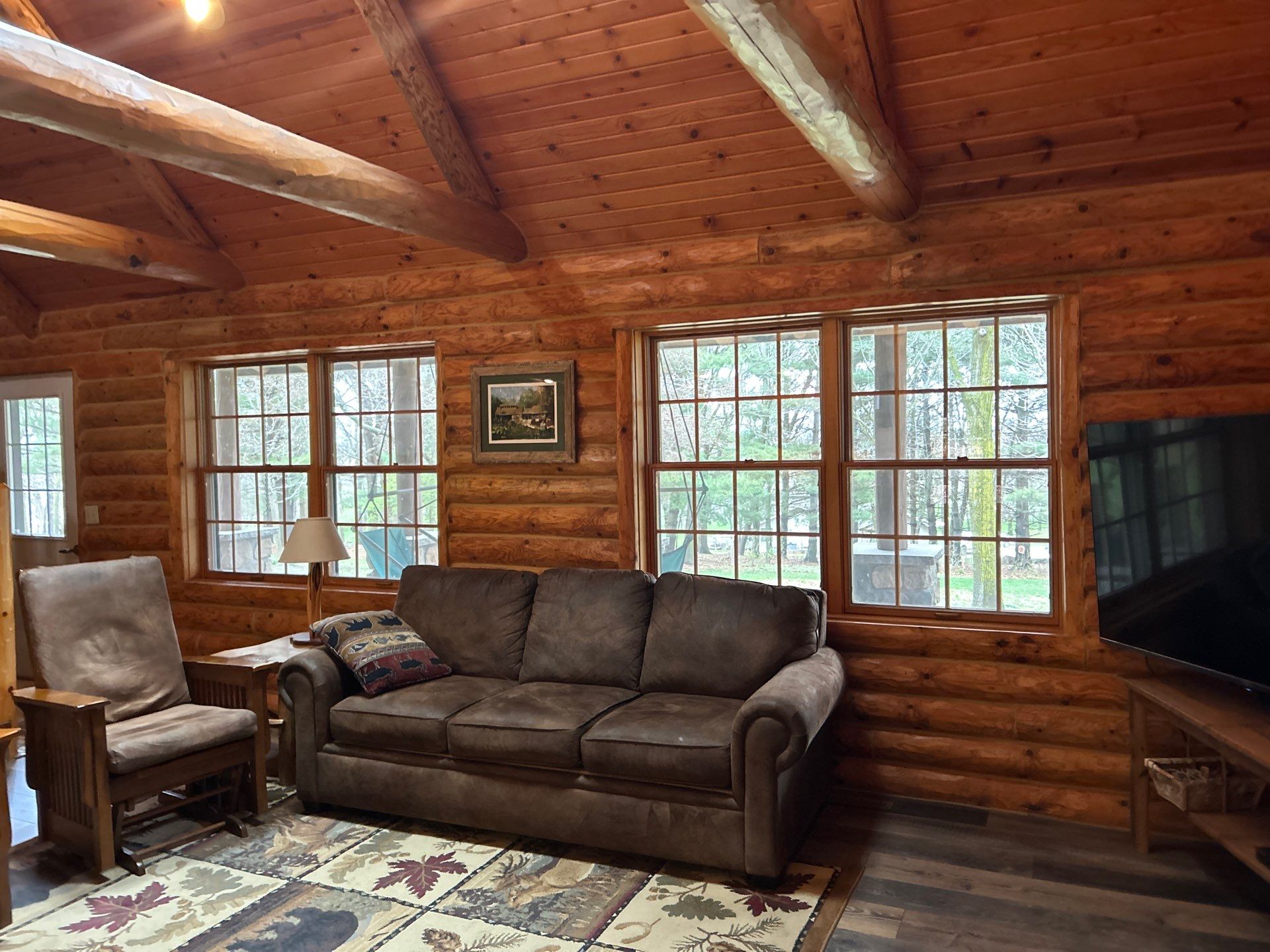 Pella Window installation using Pella Lifestyle wood/Aluminum window by United Windows and Siding LLC