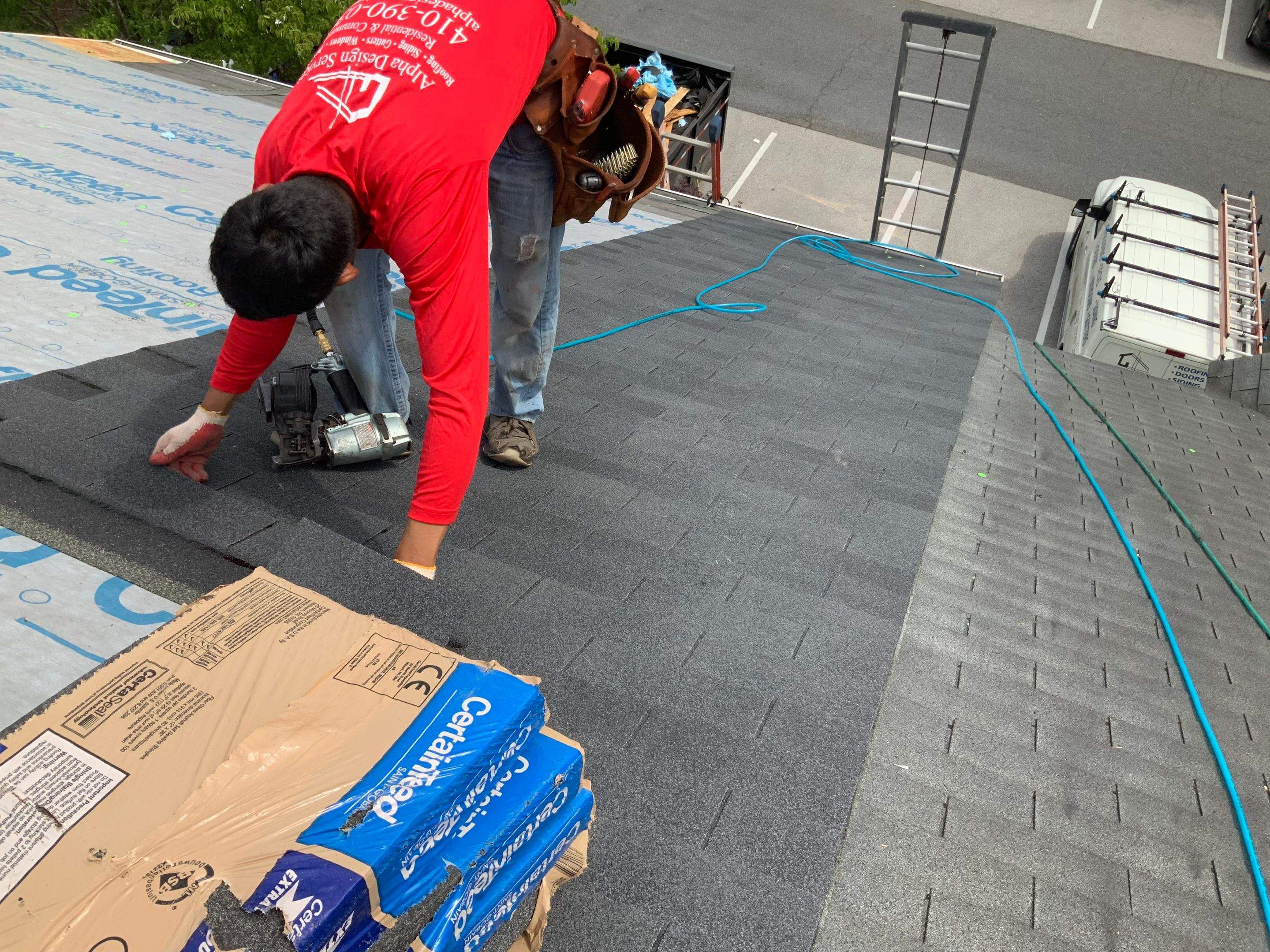 Residential Roofing Installation using XT-25 Color Moire Black by Alpha Design Services