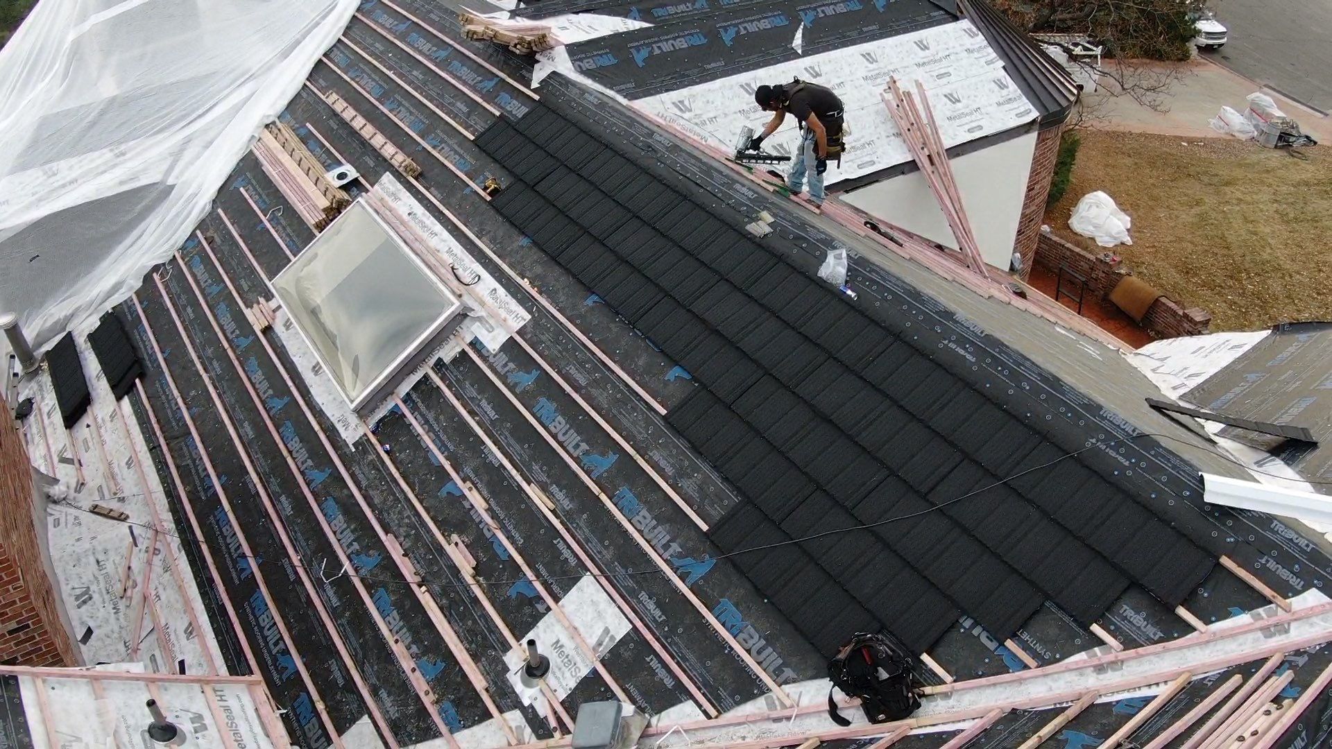 Unified Stone Coated Roof & Stucco Remodle by Blue Peaks Roofing LLC