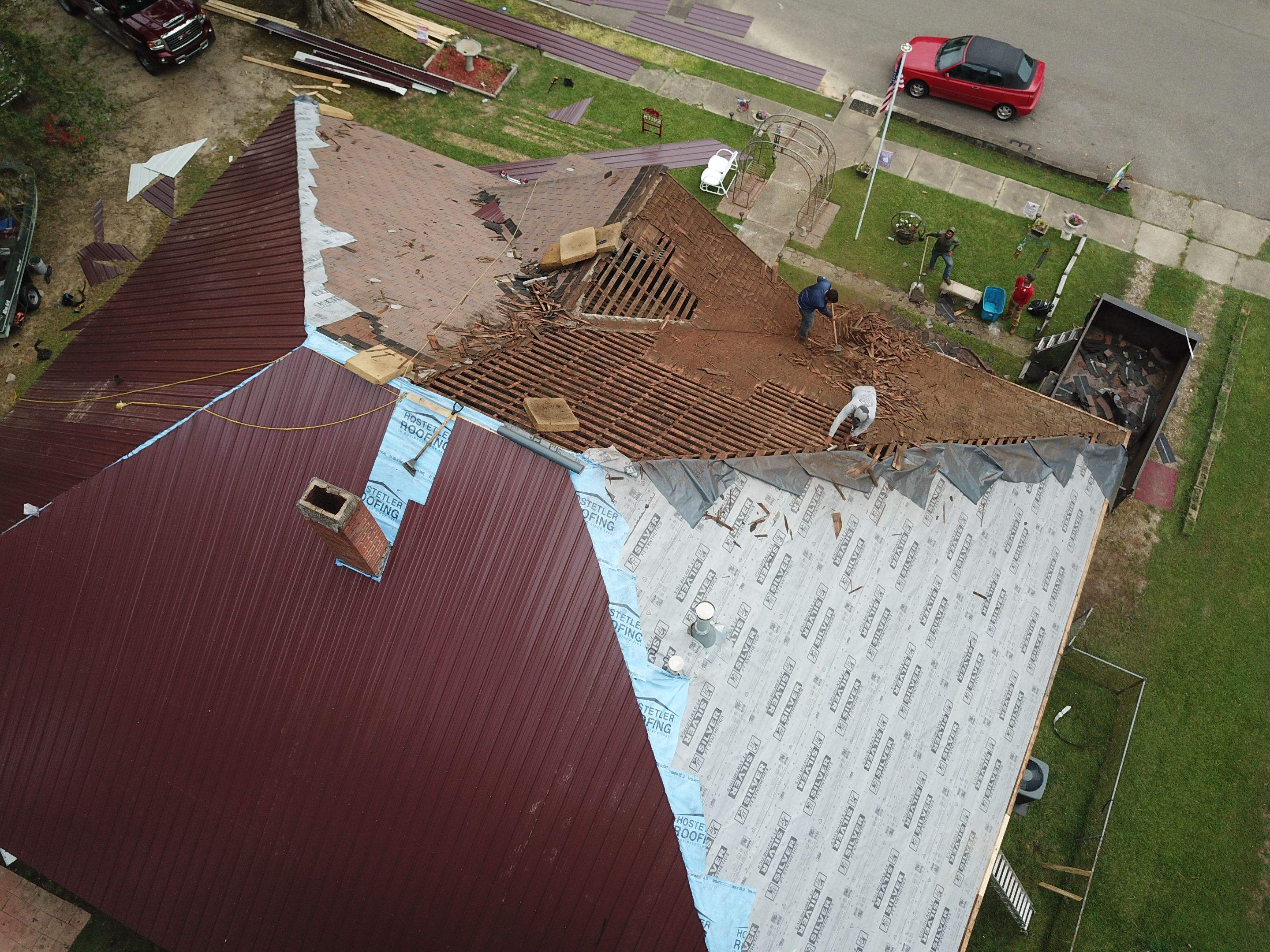 Residential Metal Roof Replacement using Reed's Metals: Colored Residental Panel (Burgundy) by Hostetler Roofing