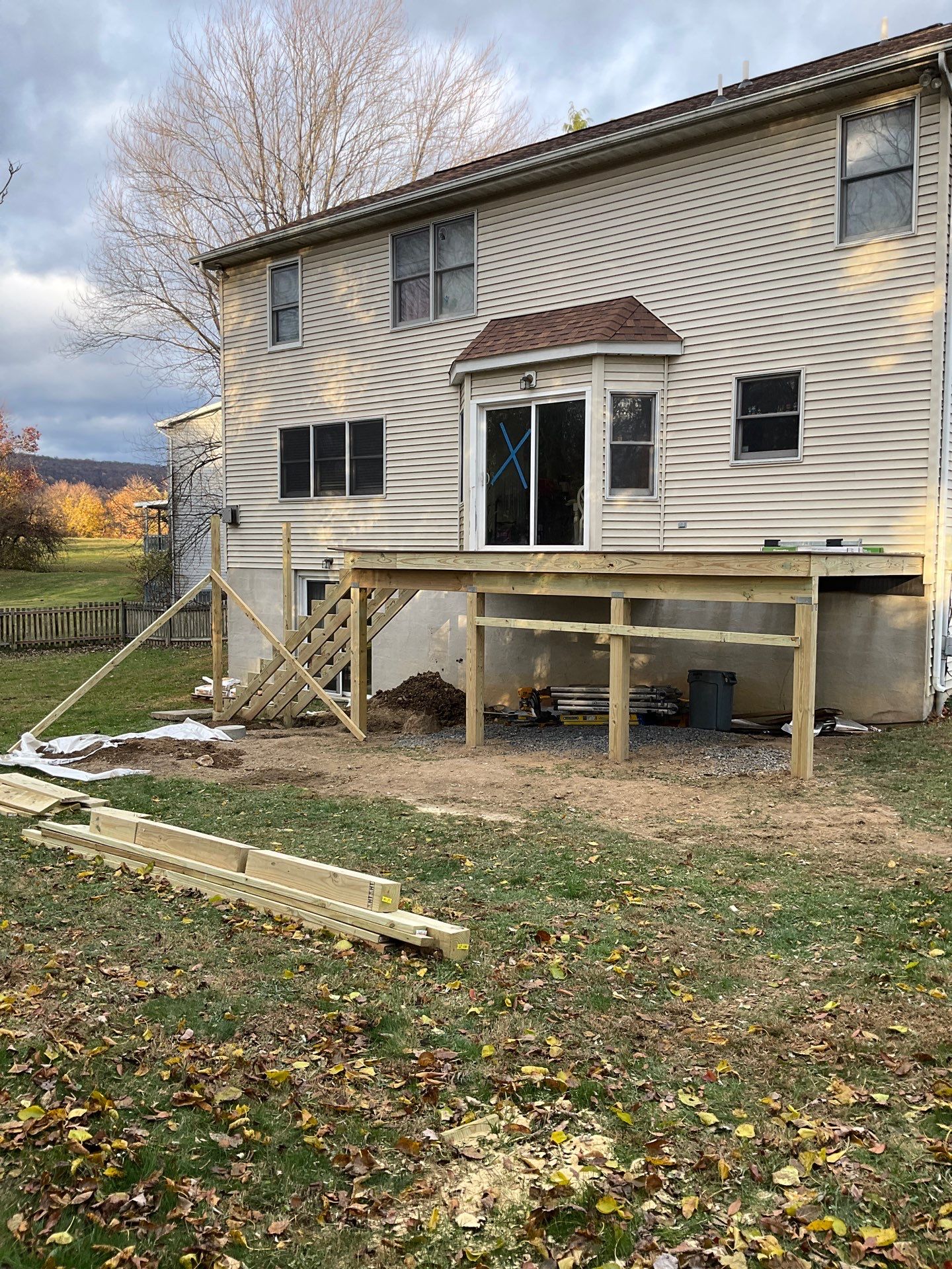 Patio door replacement and deck upgrade by Esh Builders