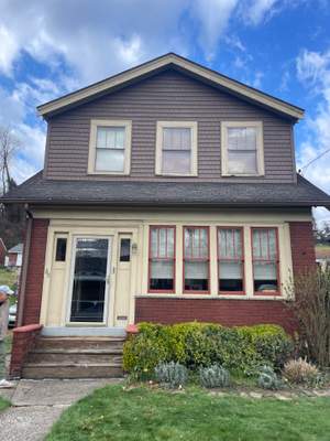 Mastic Discovery Home Siding Renovation in Musket Brown