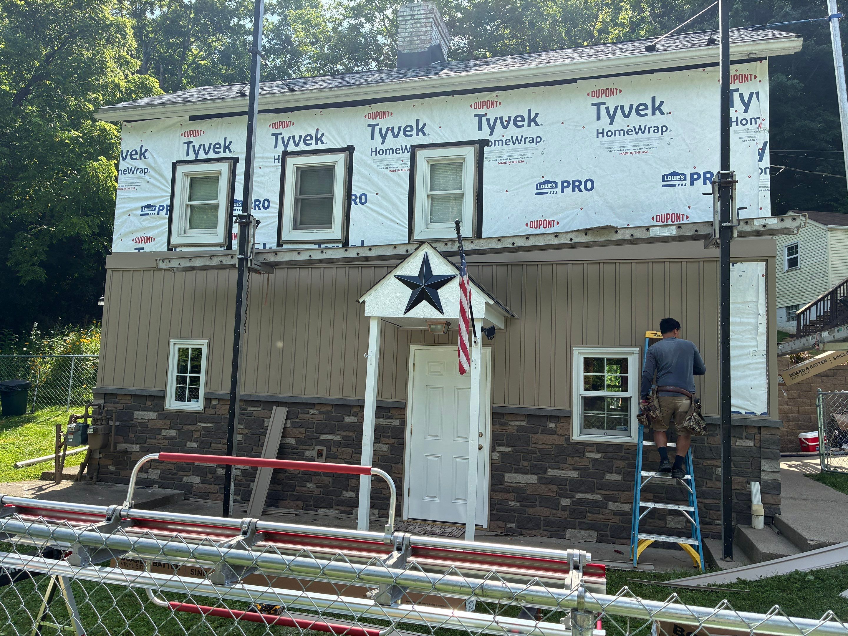Jefferson Hills Vertical Board and Batten Siding and TandoStone Renovation by Ideal Siding Pittsburgh