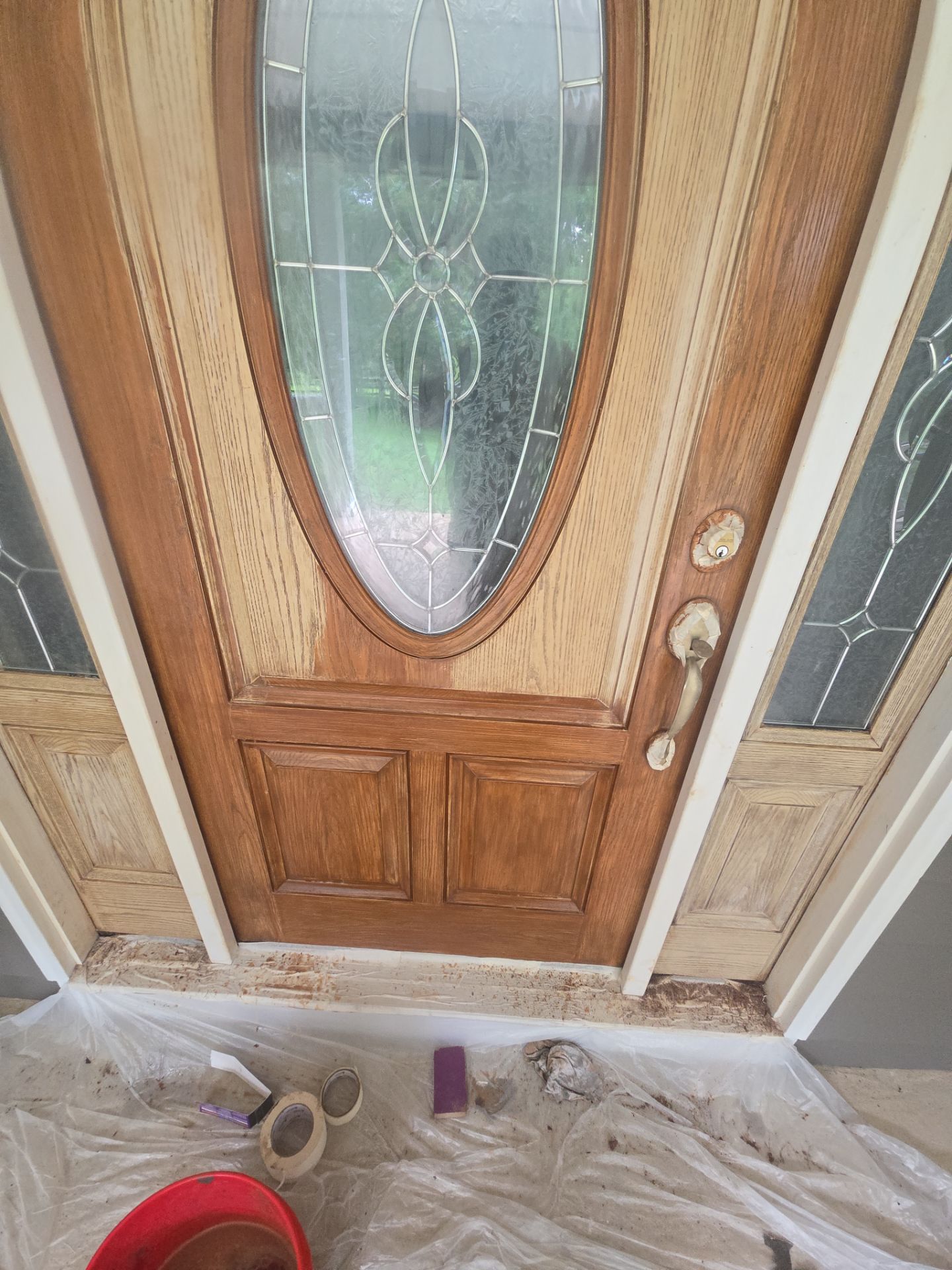Siding replacement, exterior painting, and front door staining. by GonzalezPainters & Contractors Inc